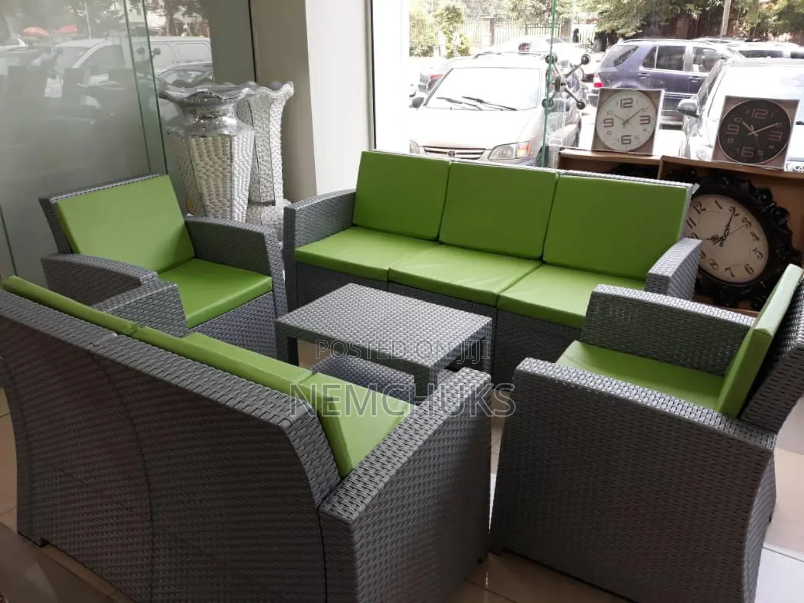 7-Seater Outdoor Synthetic Rattan Lounge Set With Green Cushions.