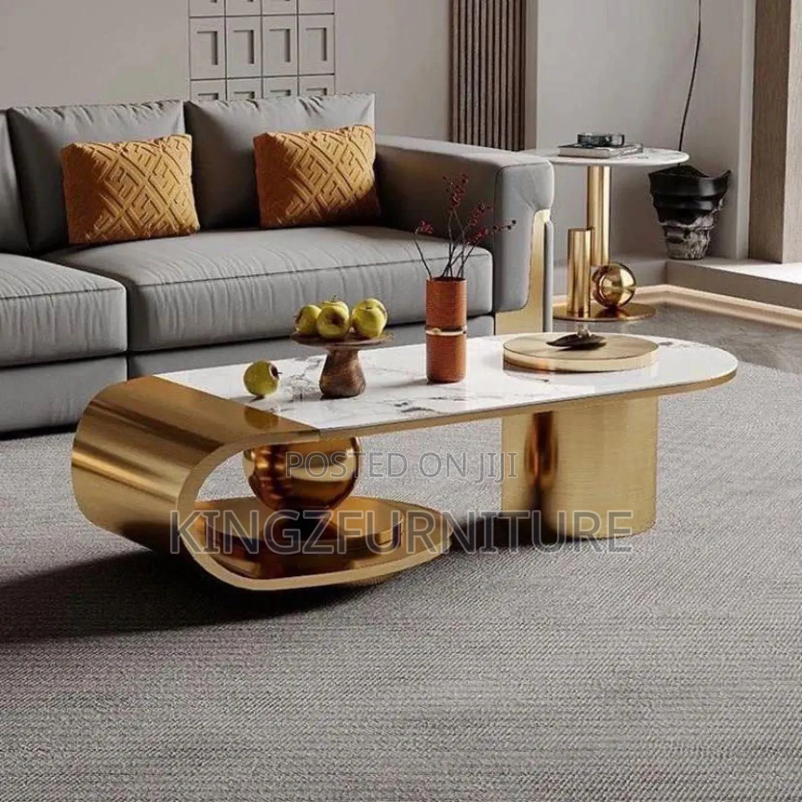 Center Table Featuring White Marble Top With a Gold Colored Steel Base