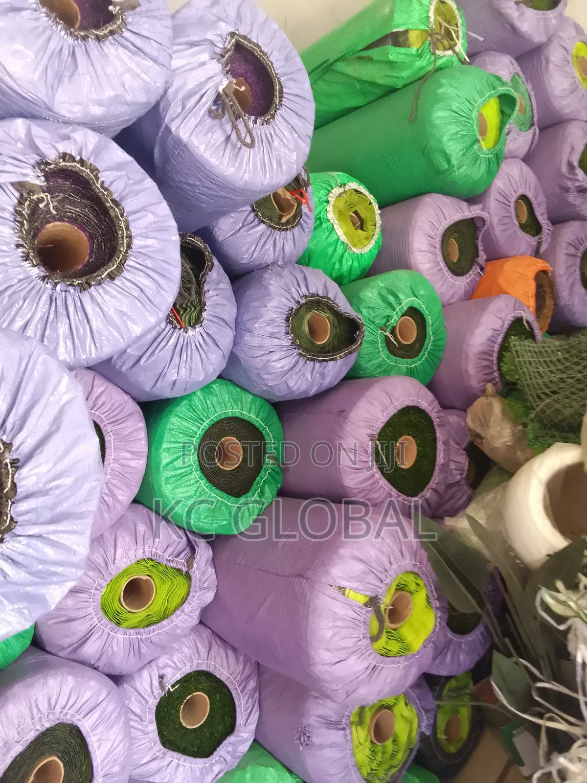 Artificial Grass Available in Different Sizes and Colors.
