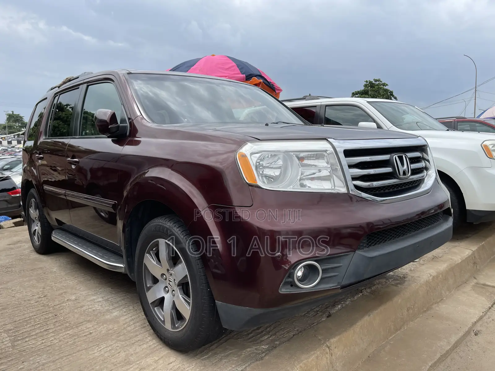 Honda Pilot Touring w/RES/Navi 4WD (3.5L 6cyl 5A) 2012 Maroon