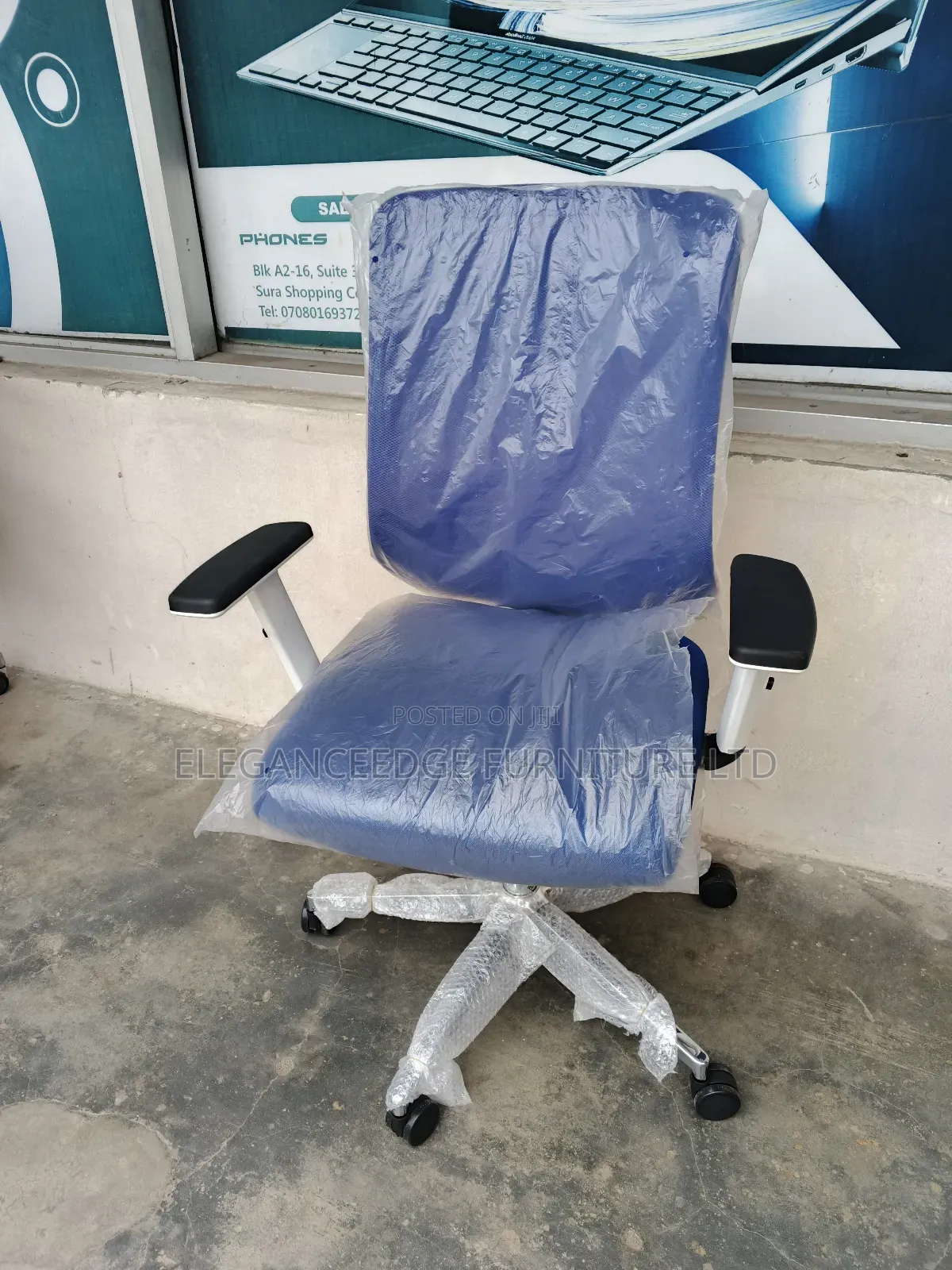 Blue Net Office Chair With Adjustable Arms and Recliner
