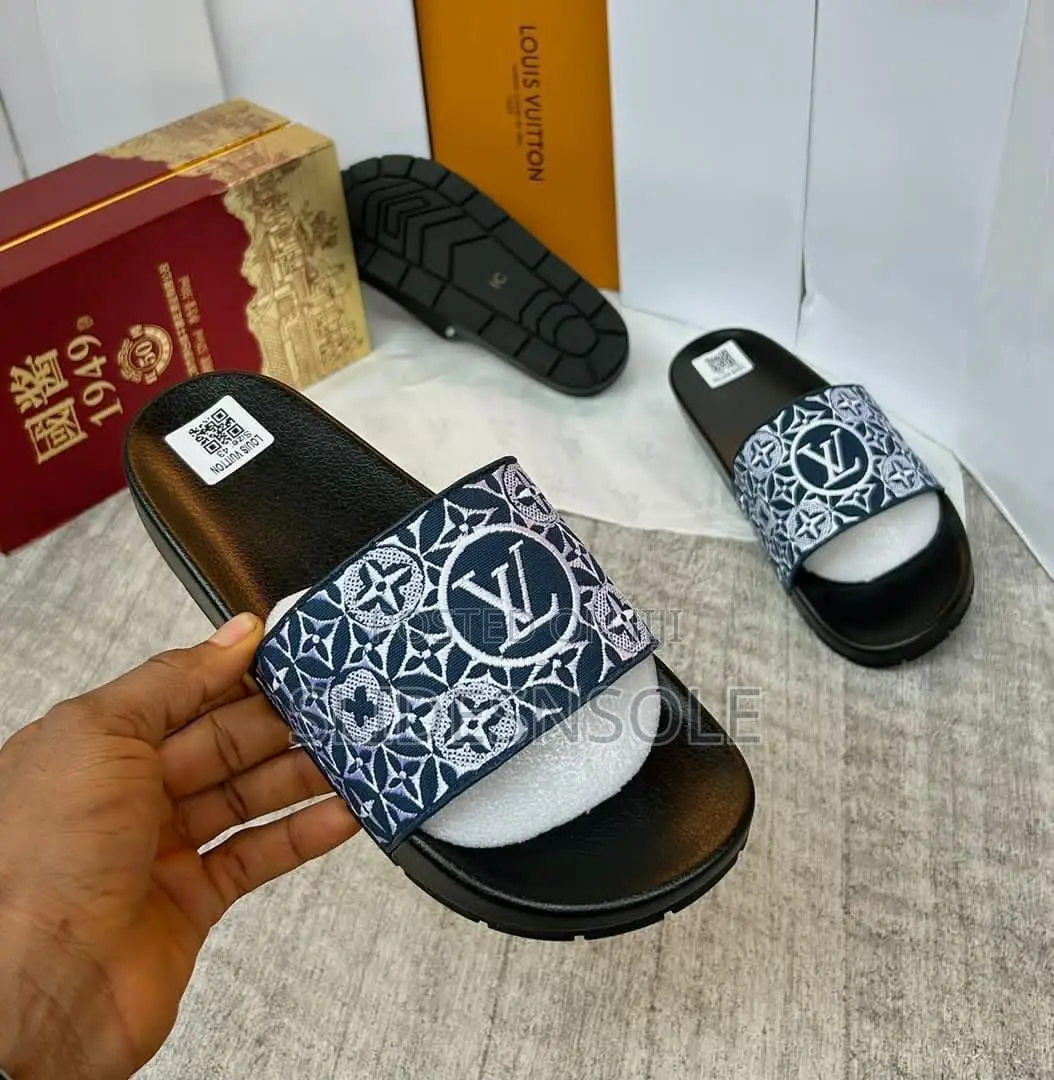 Lily Flat Mule by Louis Vuitton.