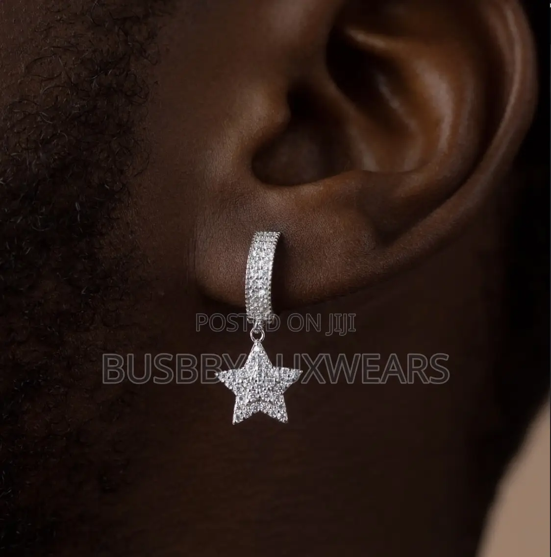 VVS Moissanite Sterling Silver Hoop Earring With a Star-Shaped End.