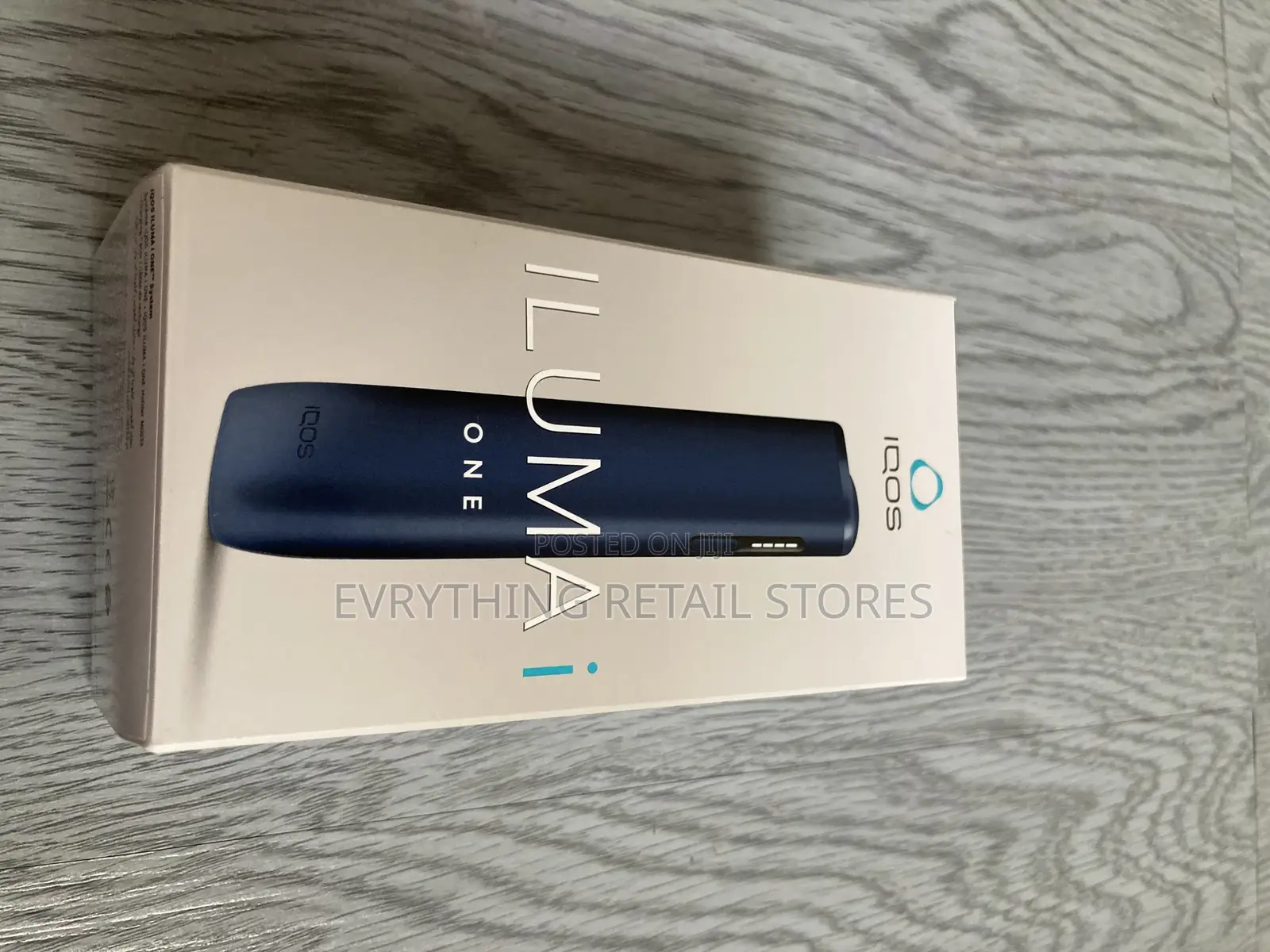 Iqos Iluma Pocket-Sized Tobacco Heating Device. Free Menthol Sticks