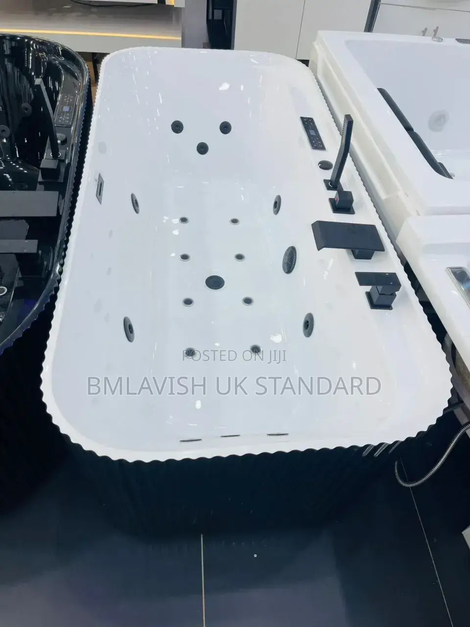 Single Jacuzzi With Black Accessories