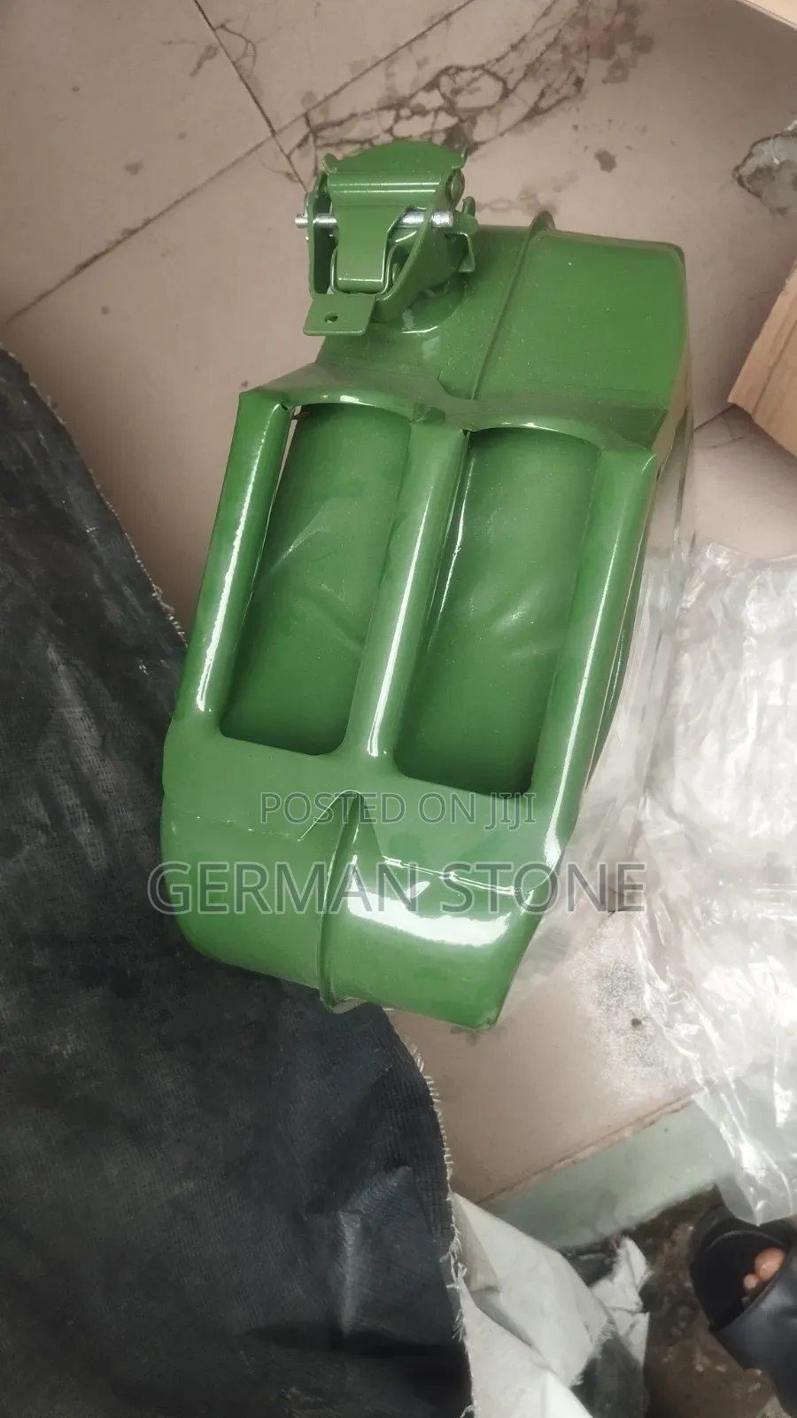 20-Litre Green Metal Jerry Can for Fuel Storage.