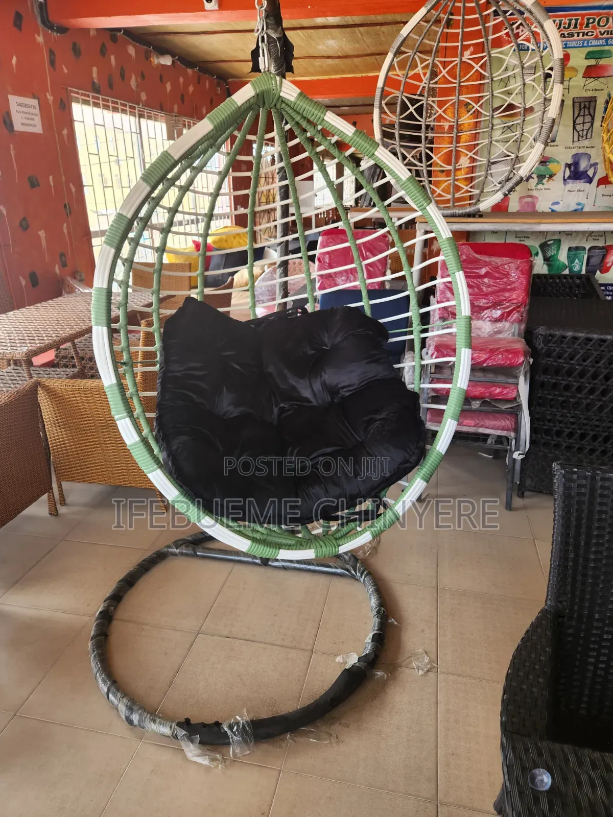 Green and White With Black Cushion Swinging Chairs