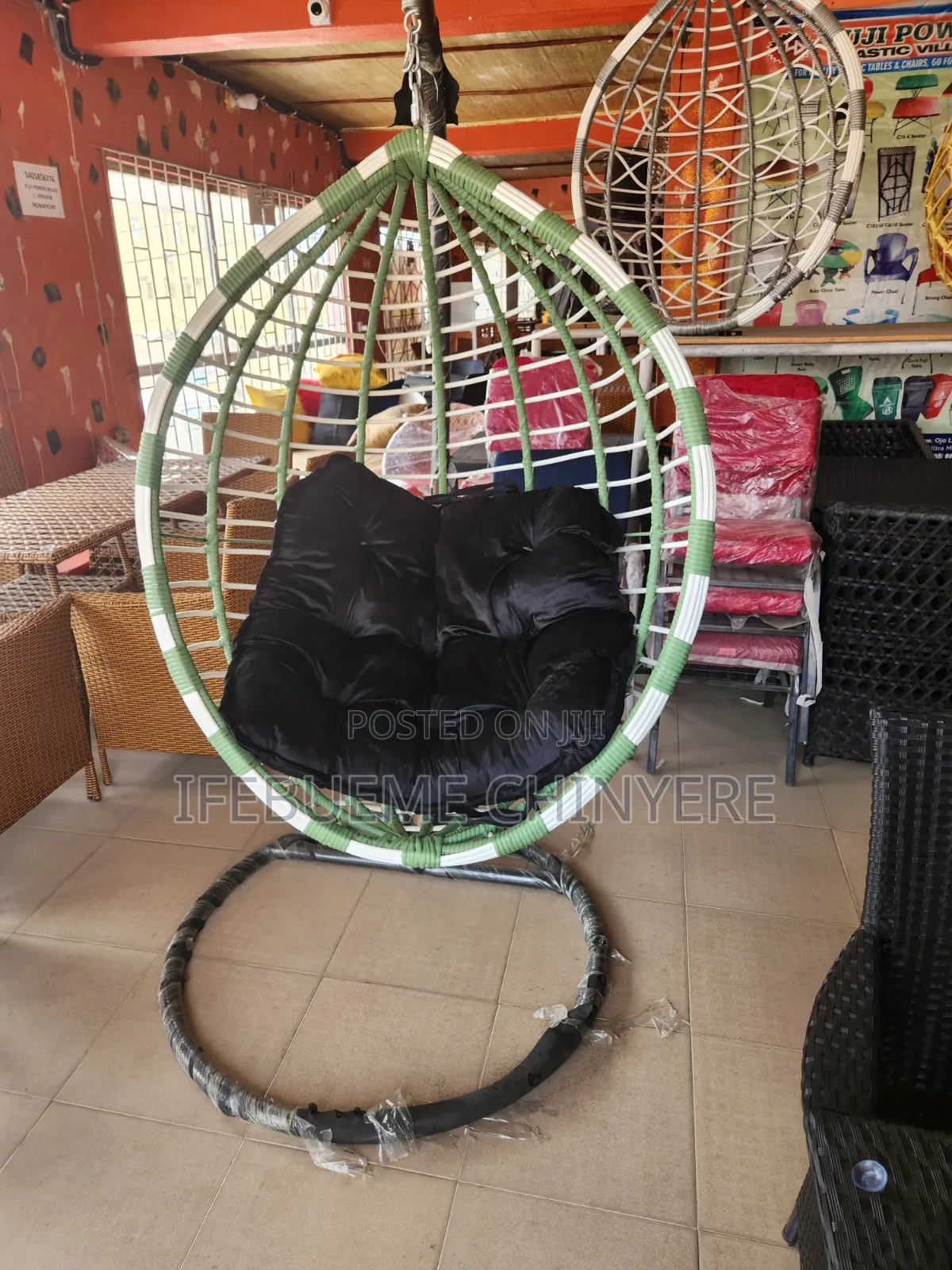 Green and White With Black Cushion Swinging Chairs