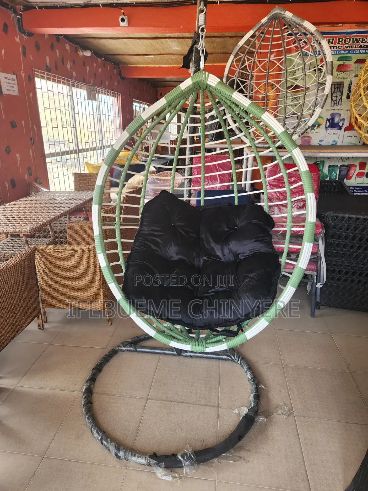 Green and White With Black Cushion Swinging Chairs