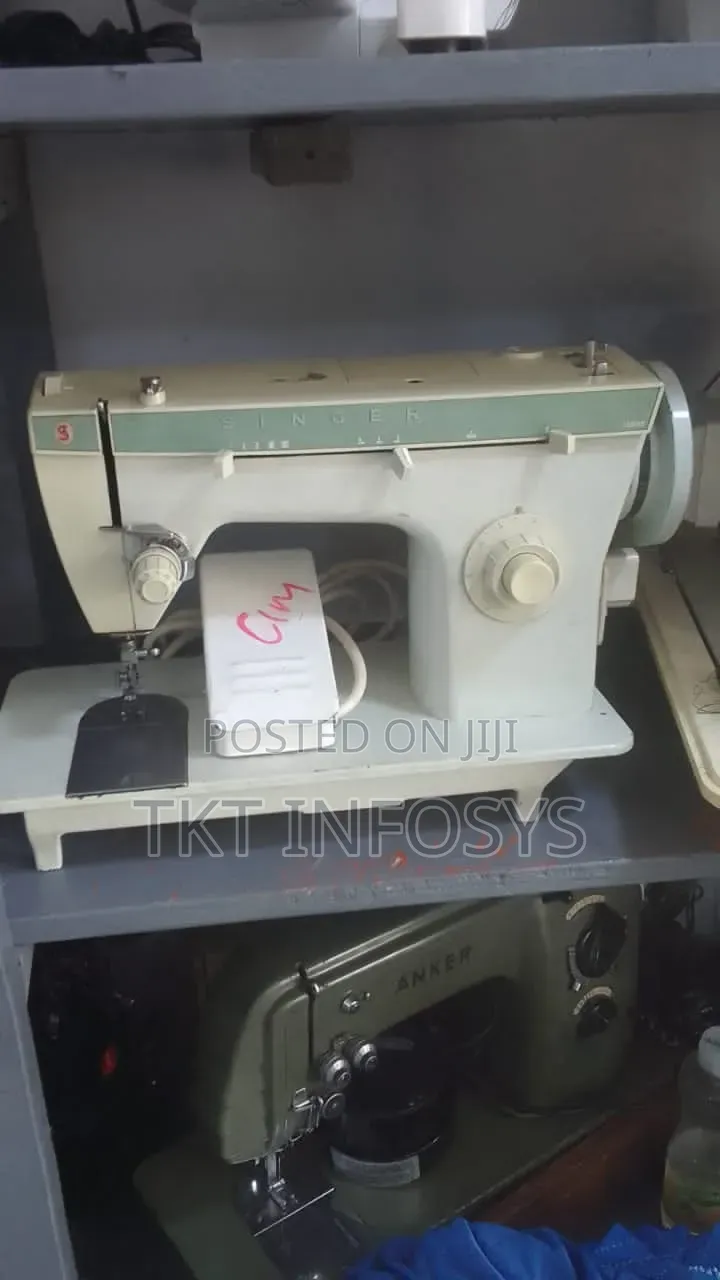 Singer Electric And Manual Machine