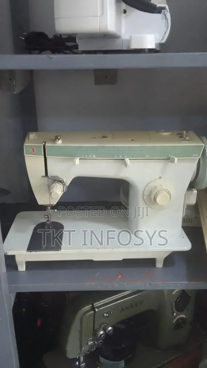 Singer Electric And Manual Machine
