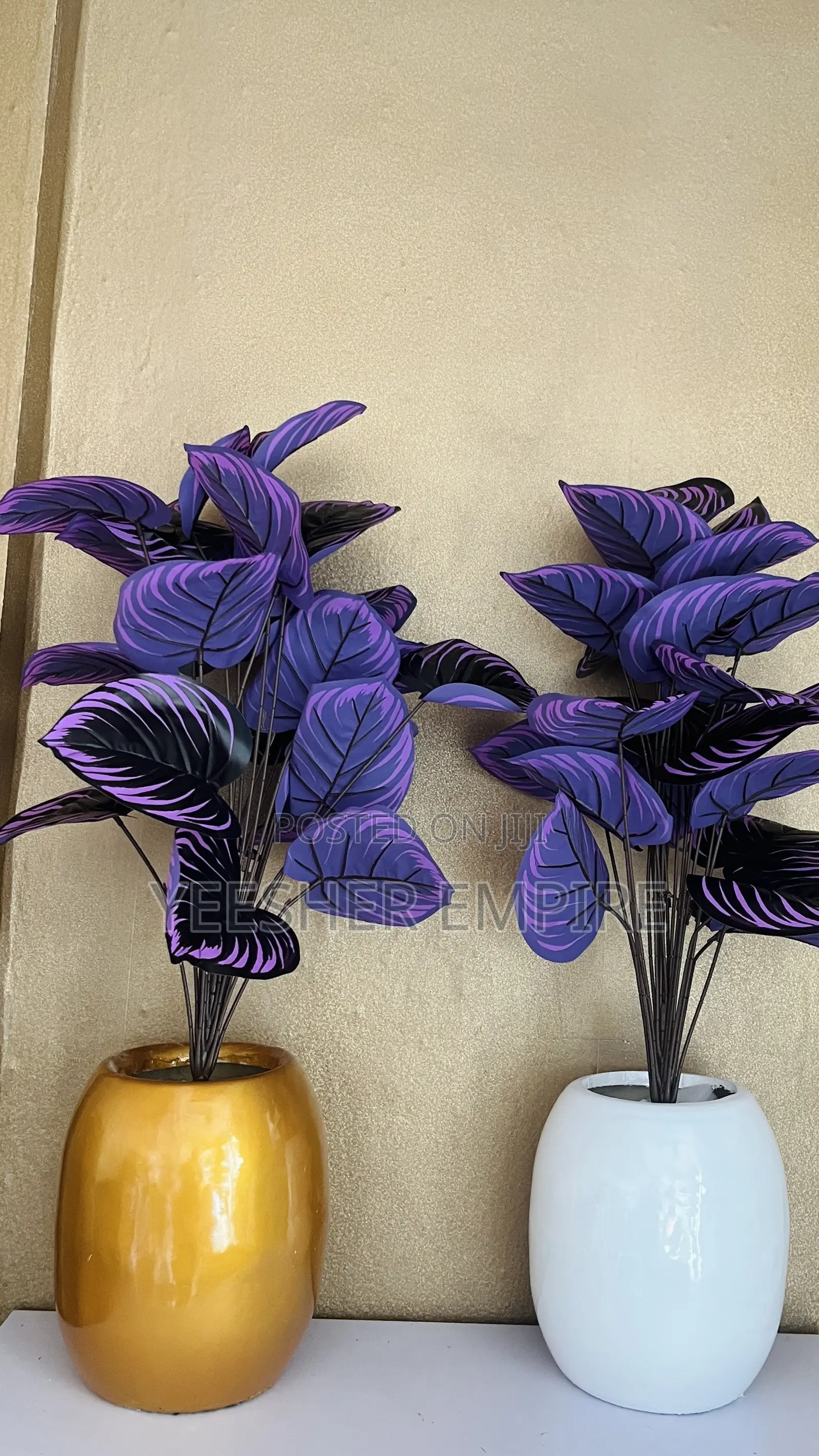 Artificial Flowers in Fibreglass Vase