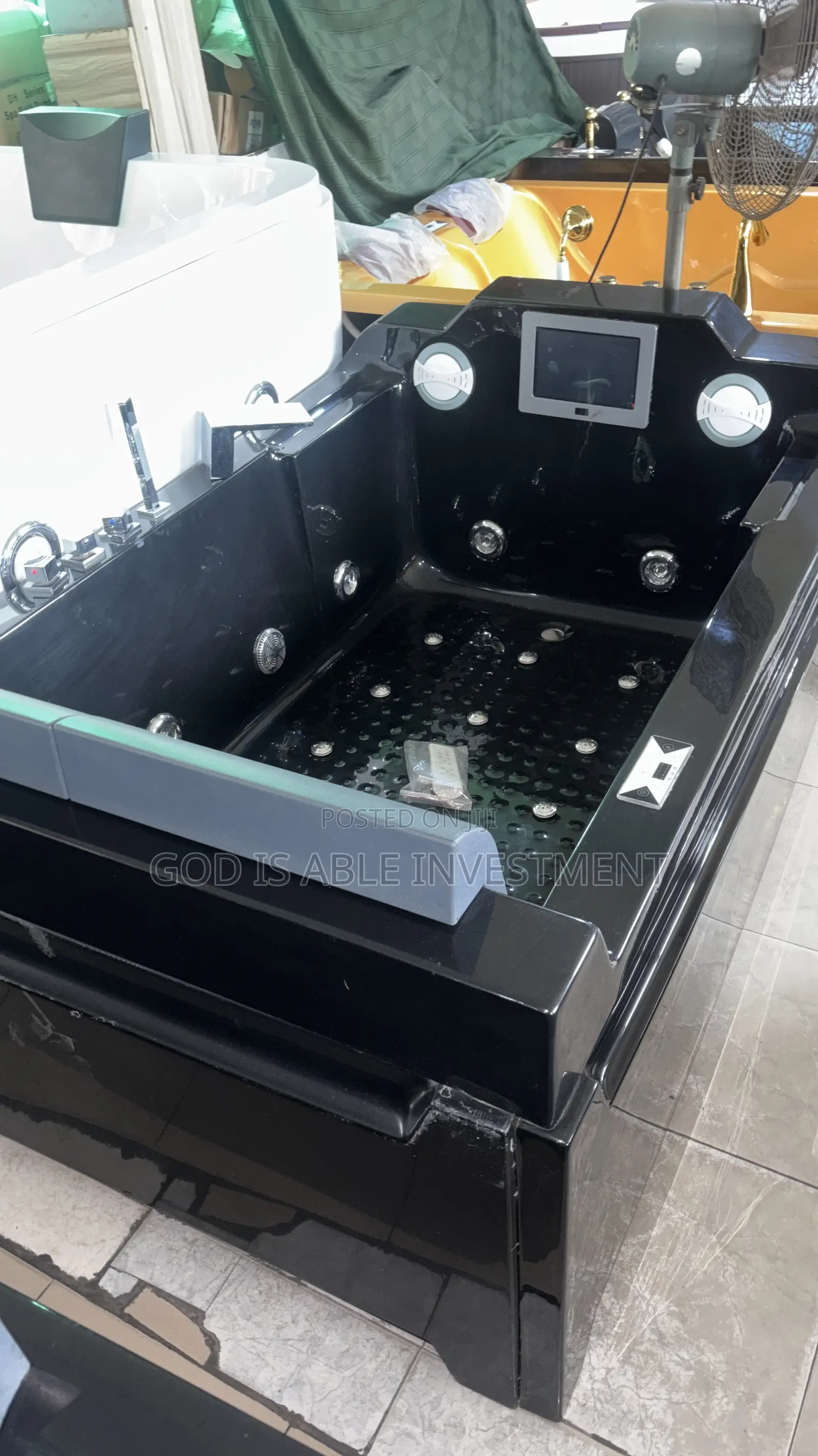 Black Jacuzzi With Tv Set