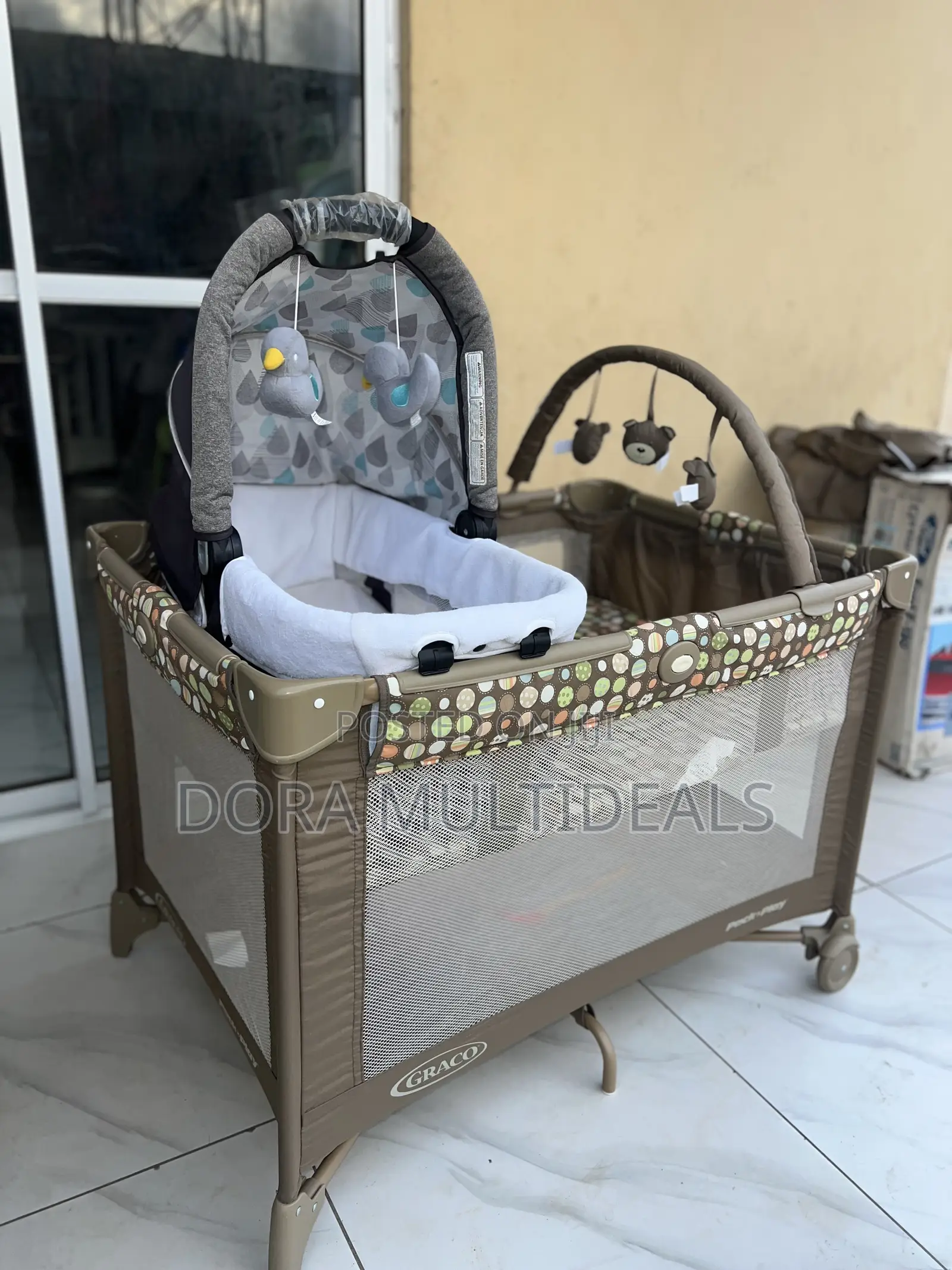 Graco Baby Cot With Extra Bassinet, Baby Rattle and Net