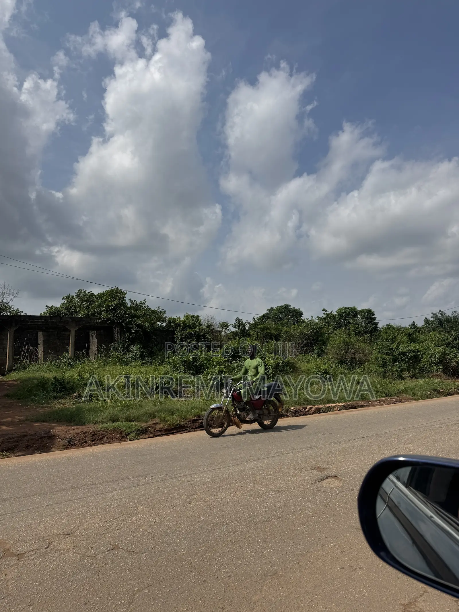 1 Acre of Land Fenceddirectly With 4 Shops