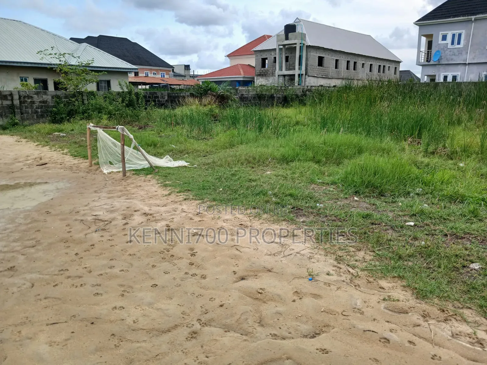 Fenced Plots of Land in Langbasa With C of O