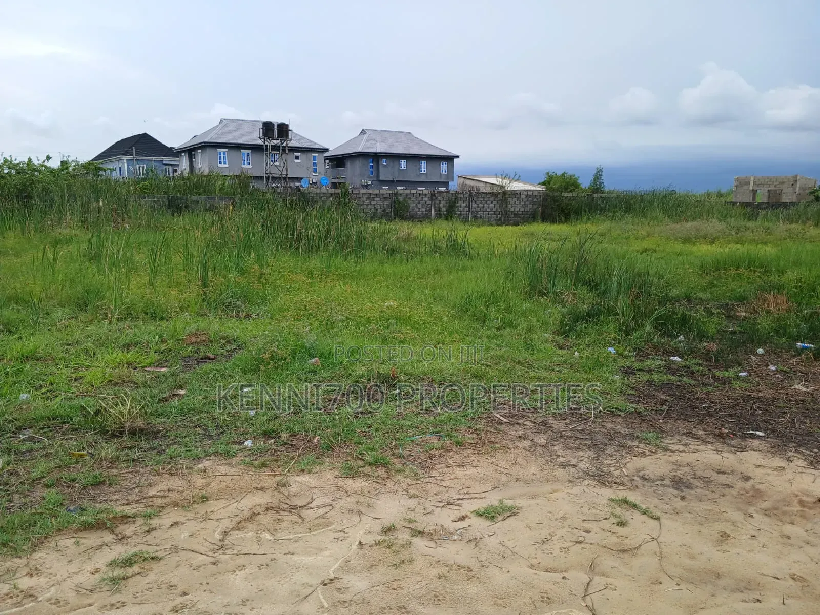 Fenced Plots of Land in Langbasa With C of O