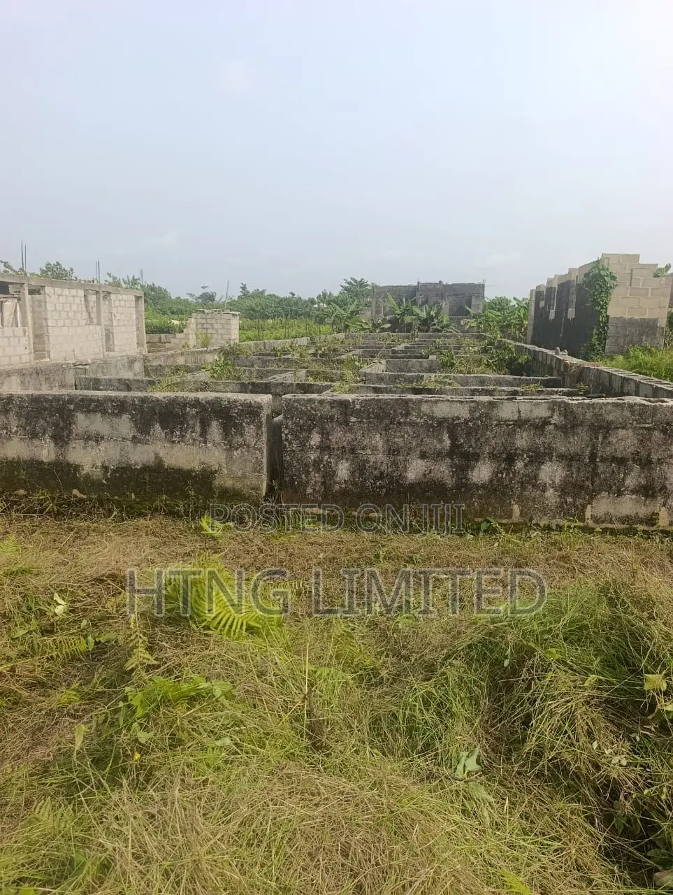 Half Plot of Land for Sale With Foundation on It