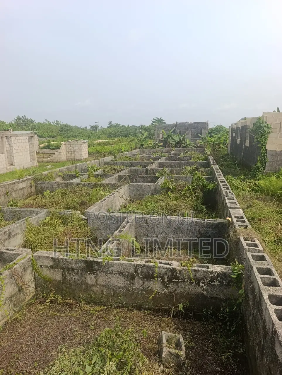 Half Plot of Land for Sale With Foundation on It