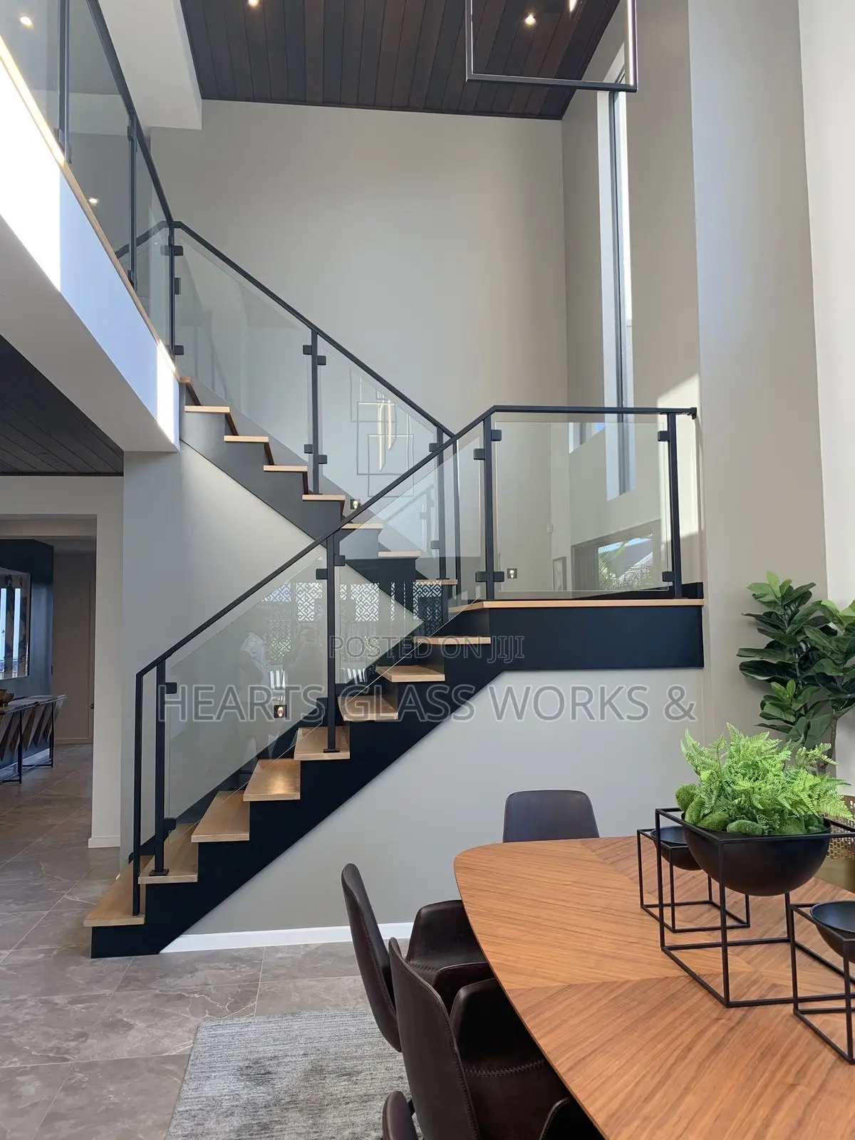 Stand Off Base Glass Stair Railings Installed With Matt Black Profile