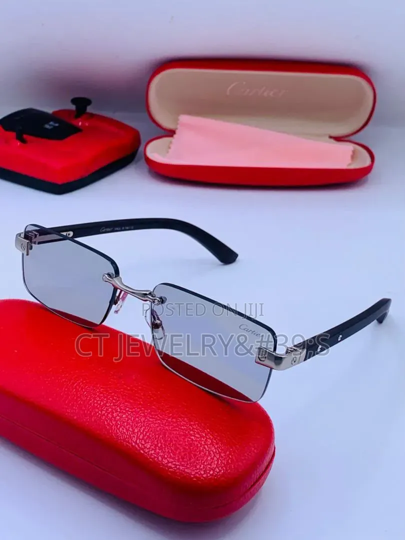 Cartier Rimless Distinctive Platinum Finish and Black Wooden Temples.