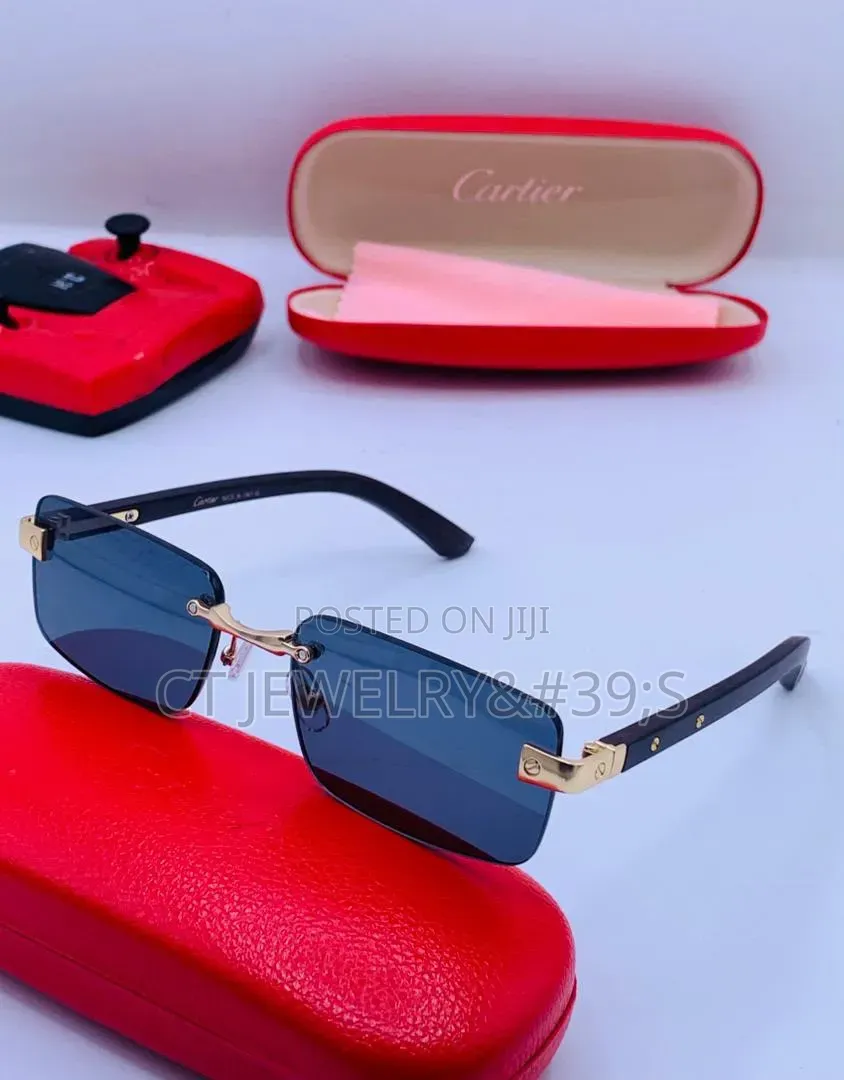 Cartier Rimless Distinctive Platinum Finish and Black Wooden Temples.