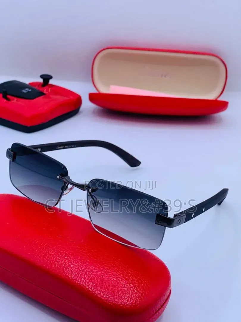 Cartier Rimless Distinctive Platinum Finish and Black Wooden Temples.