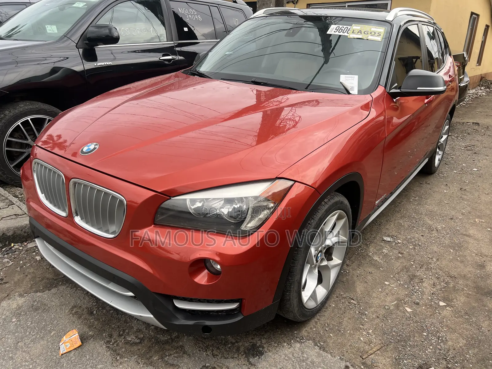 BMW X1 xDrive28i 4dr SUV AWD (2.0L 4cyl Turbo 8A) 2014 Orange