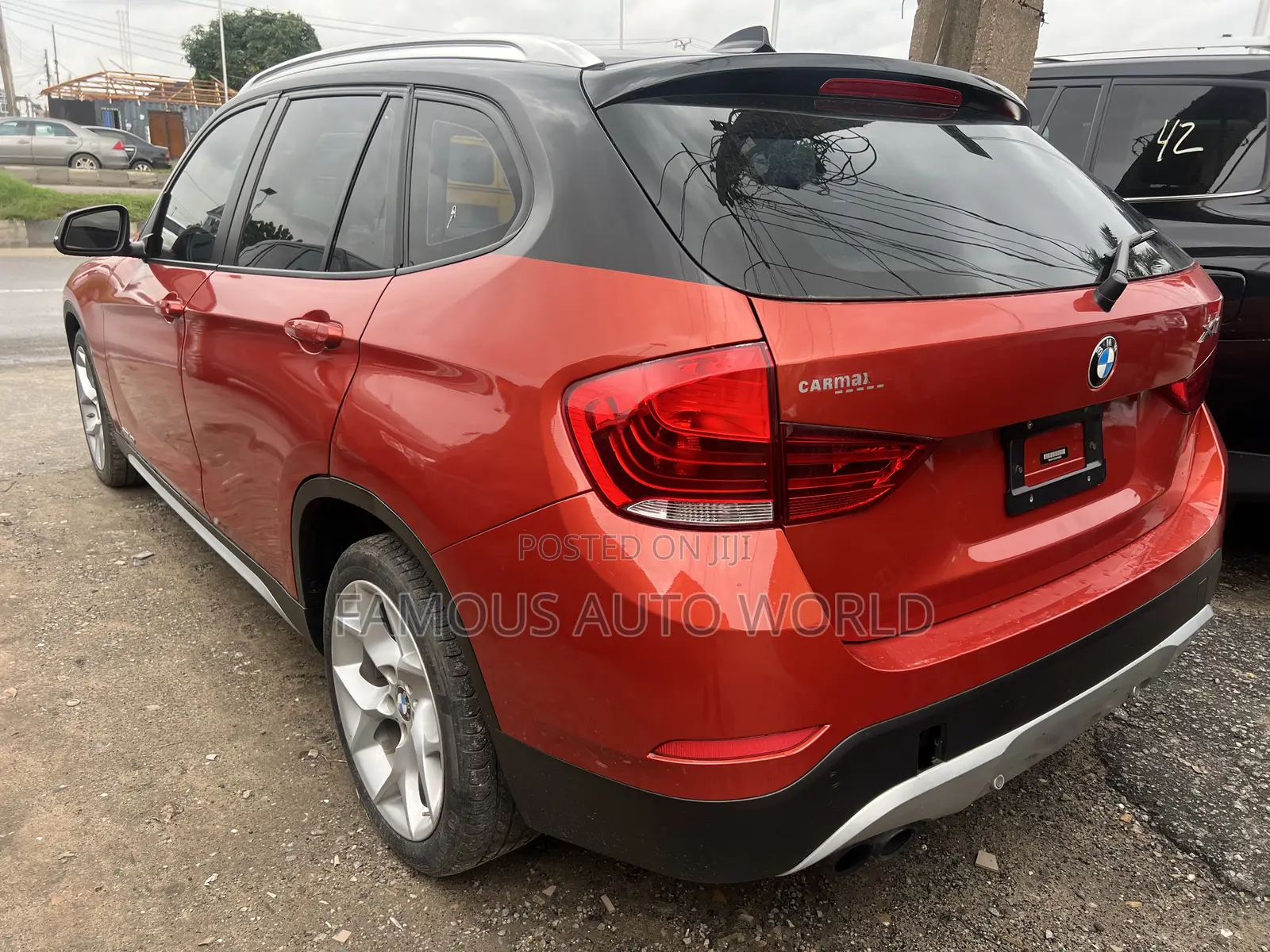 BMW X1 xDrive28i 4dr SUV AWD (2.0L 4cyl Turbo 8A) 2014 Orange