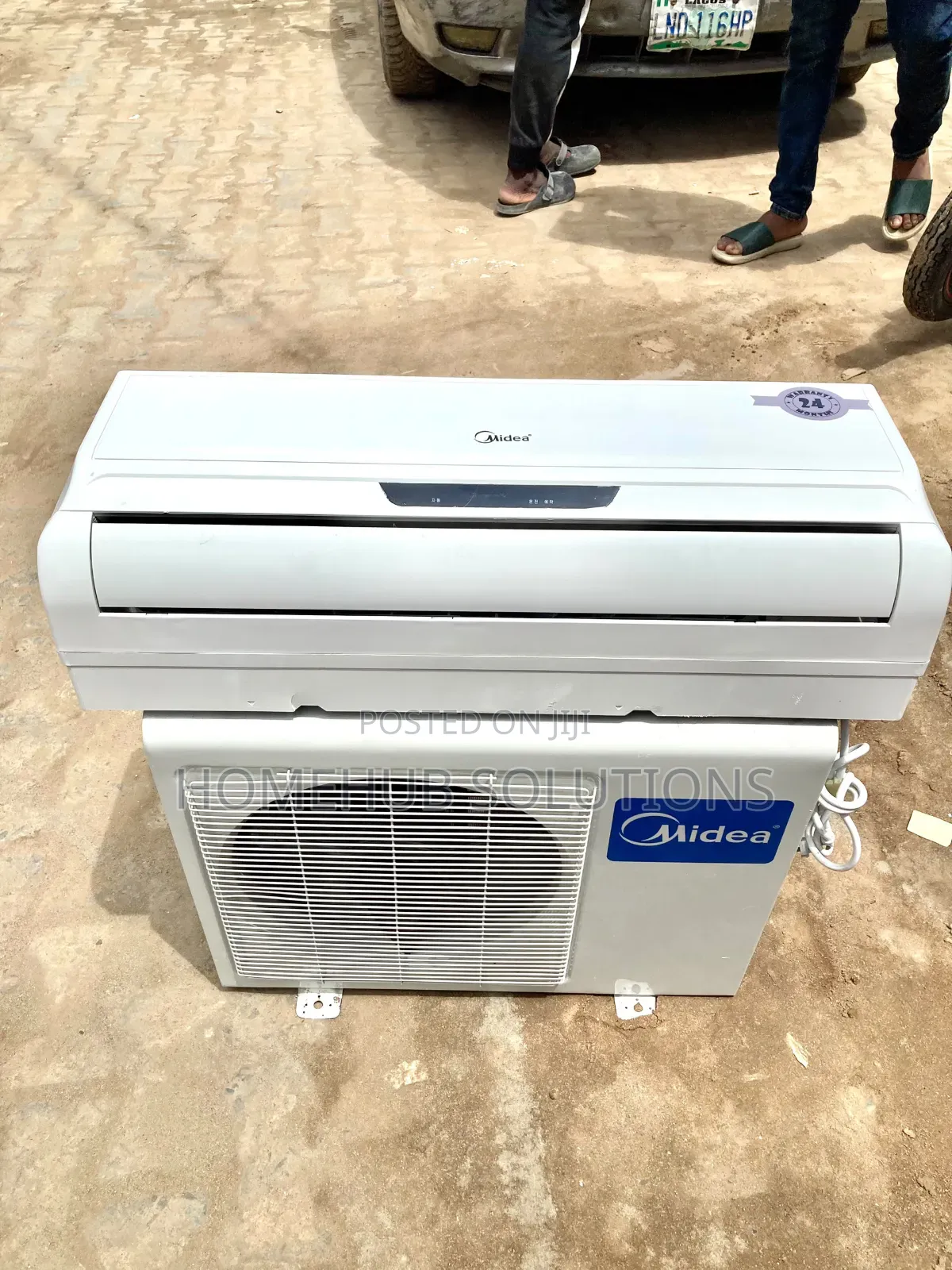 Very Clean 1.5hp Midea Air Conditioner With Indoor Hanger and Remote