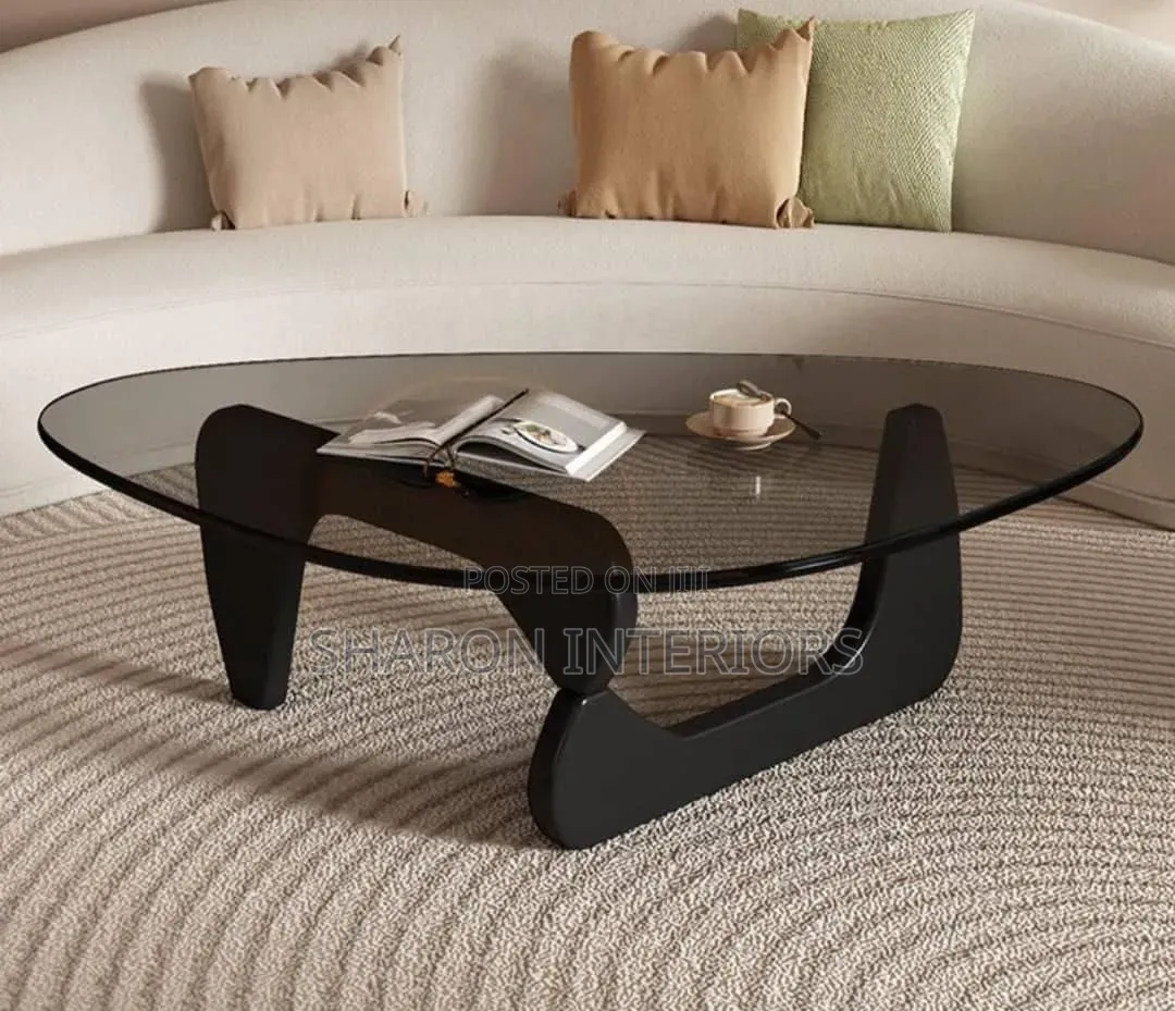 The Sculpted Noir Glass Table