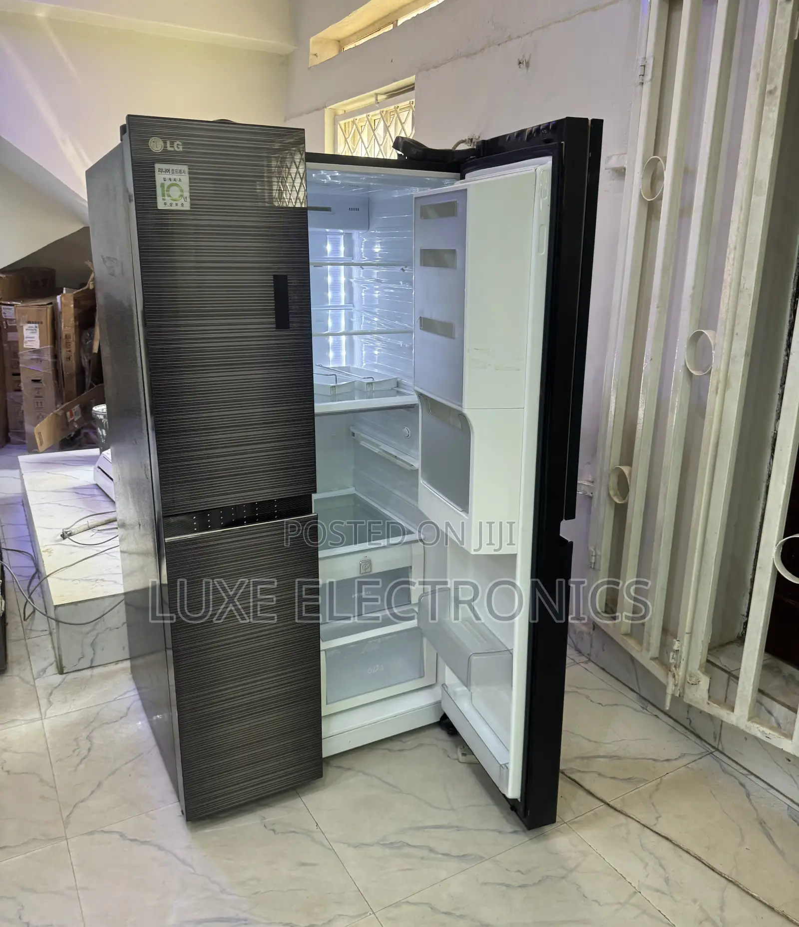 Lg 900liters Inverter Side by Side Refrigerator With Glass Exterior