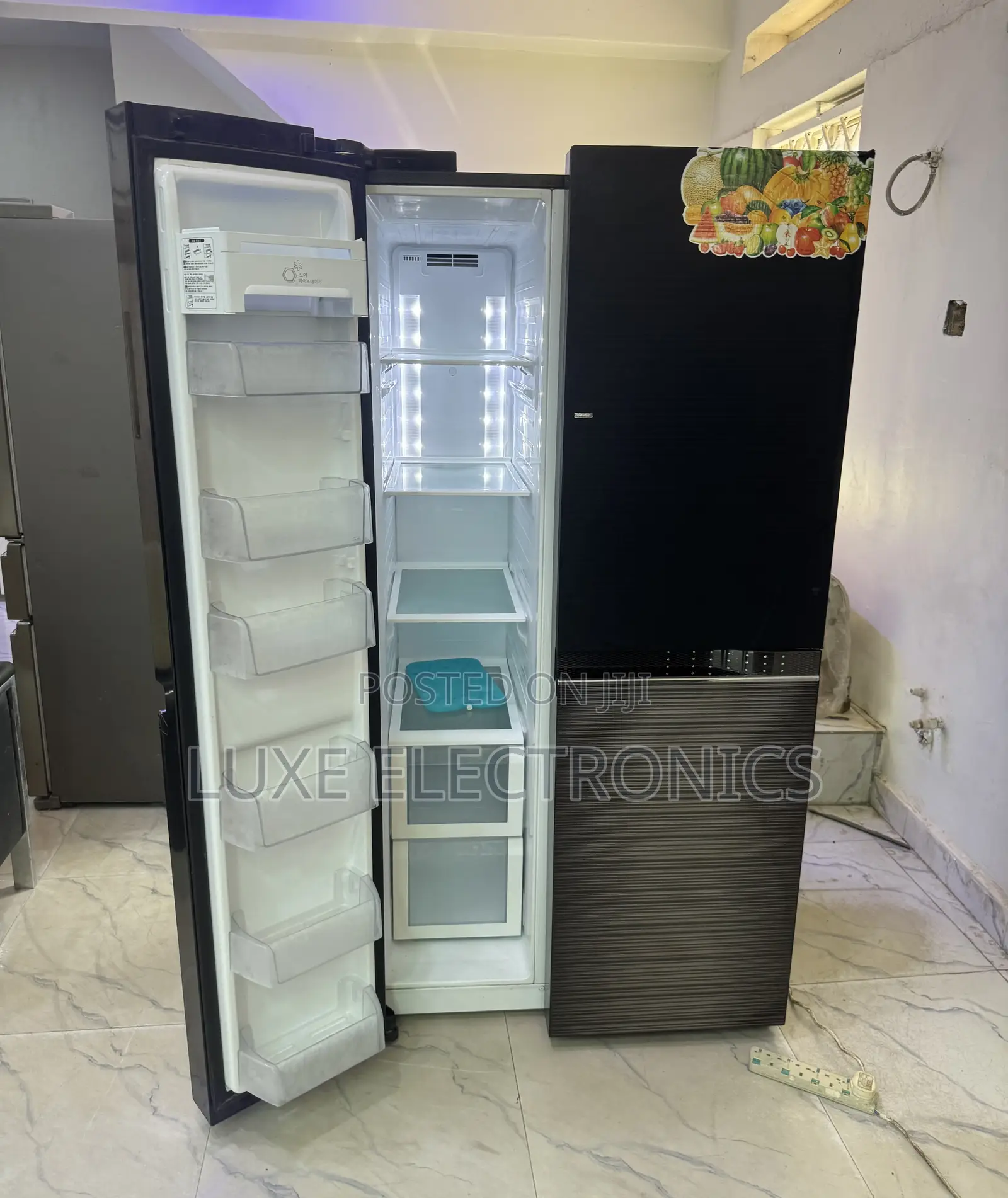 Lg 900liters Inverter Side by Side Refrigerator With Glass Exterior