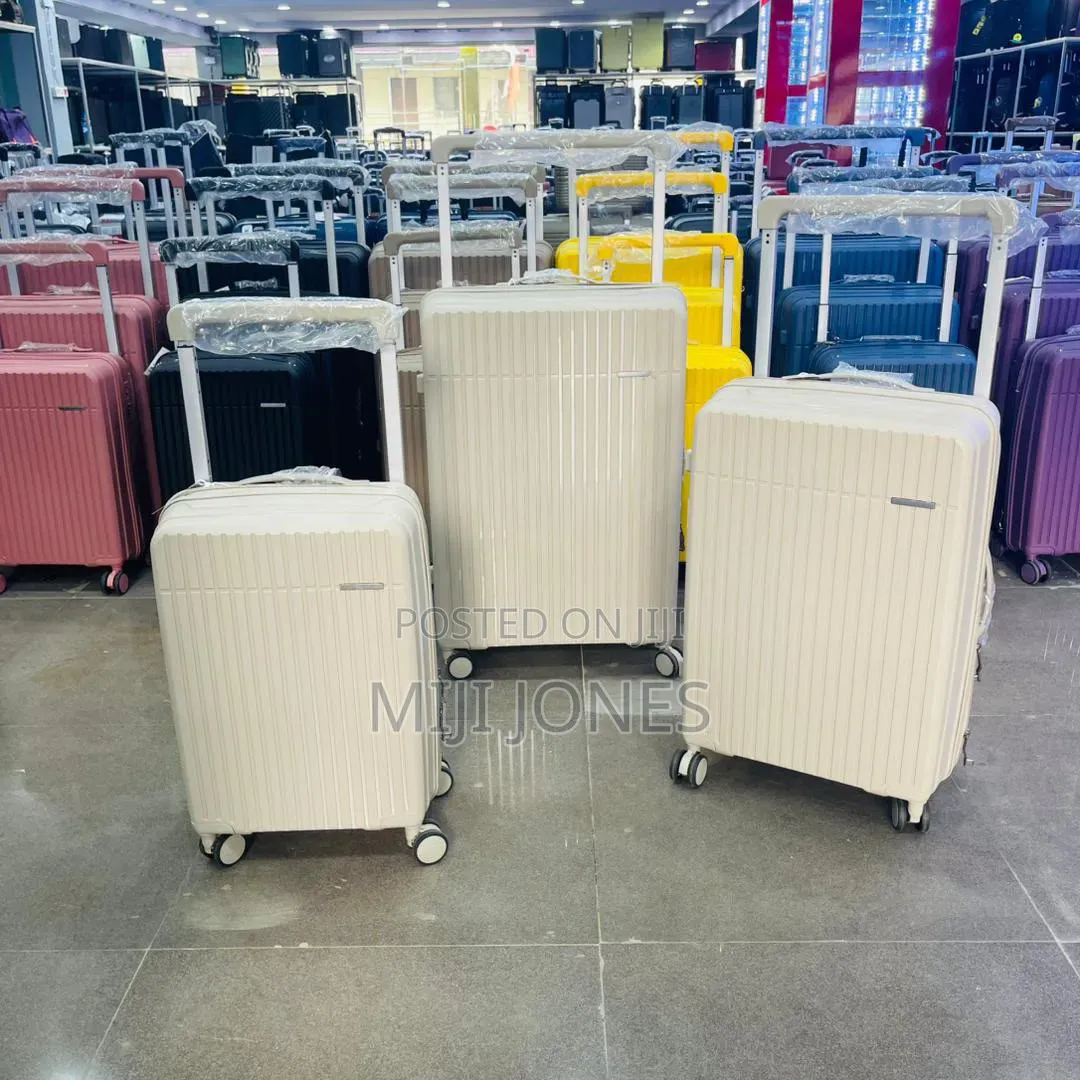 High Quality Wide Handle 4-Wheel Plastic Luggage - New*