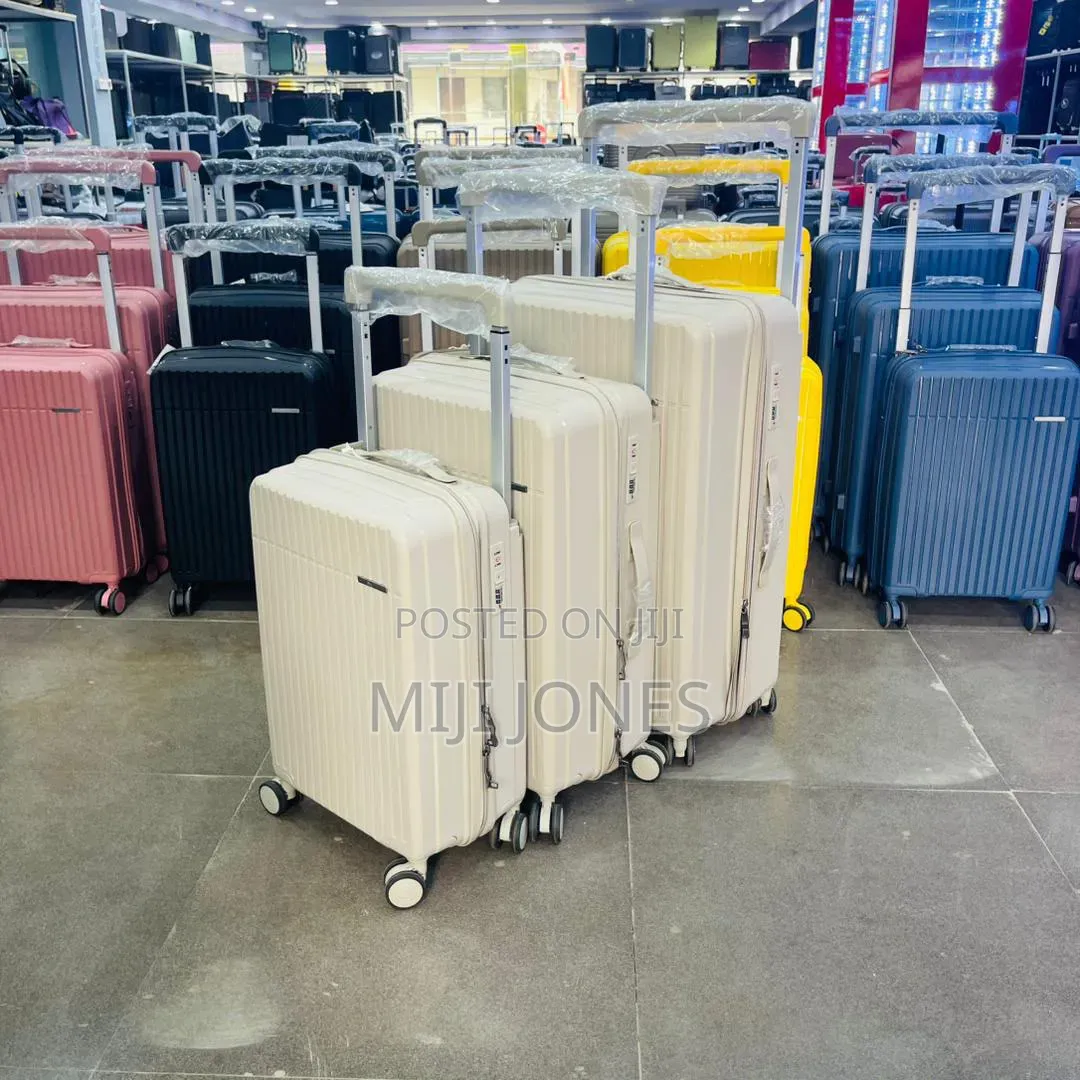 High Quality Wide Handle 4-Wheel Plastic Luggage - New*