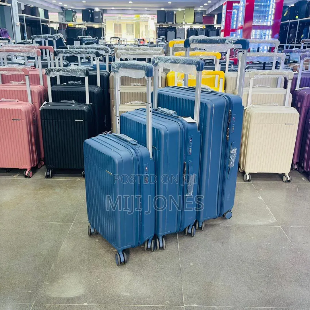 High Quality Wide Handle 4-Wheel Plastic Luggage - New*