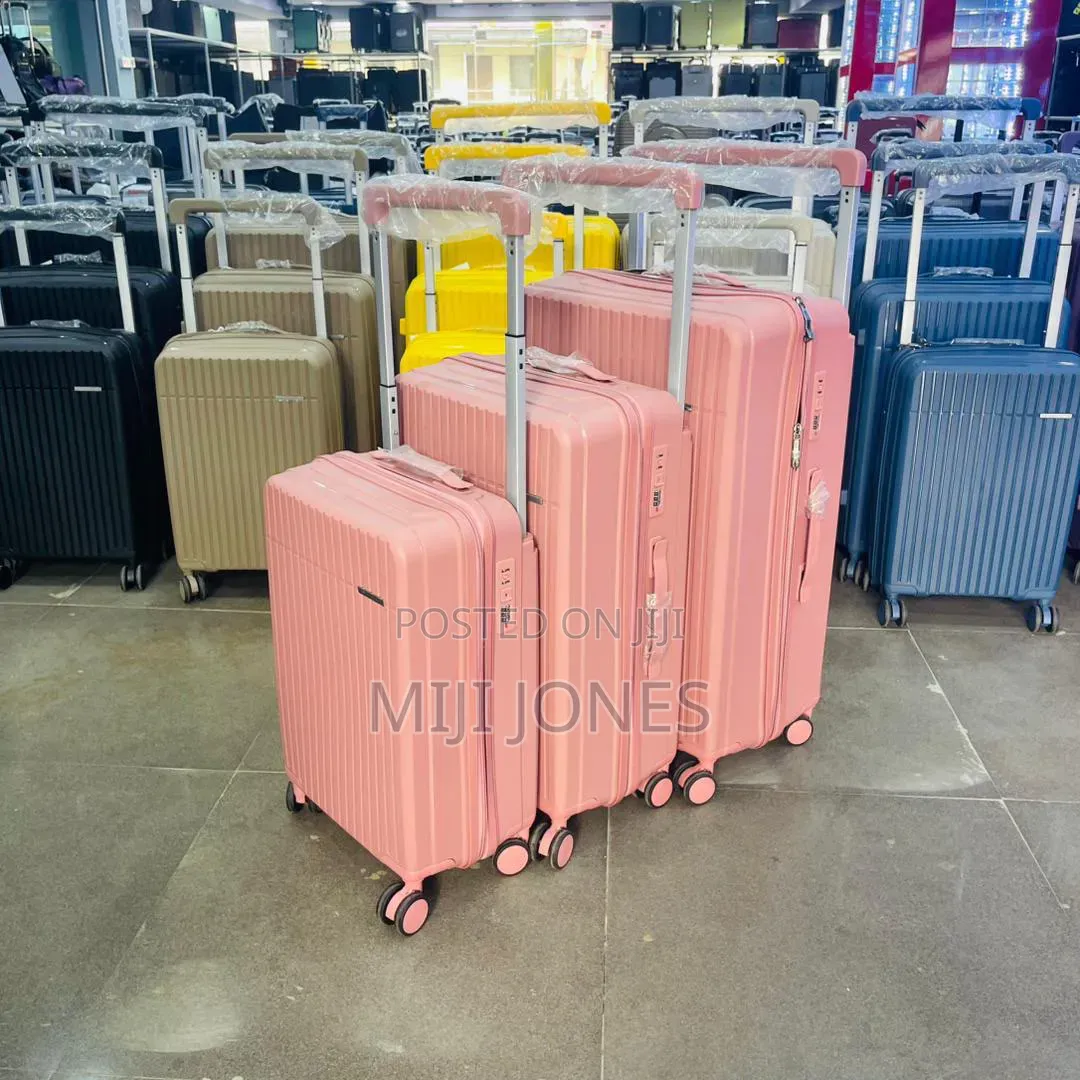 High Quality Wide Handle 4-Wheel Plastic Luggage - New*
