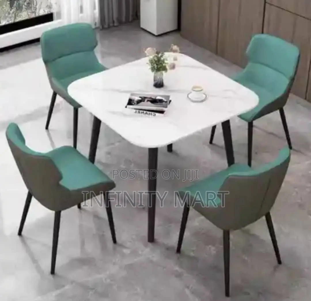 Luxury Dining Table Set (4 Chairs) – Grey Marble Top, Teal Seats.