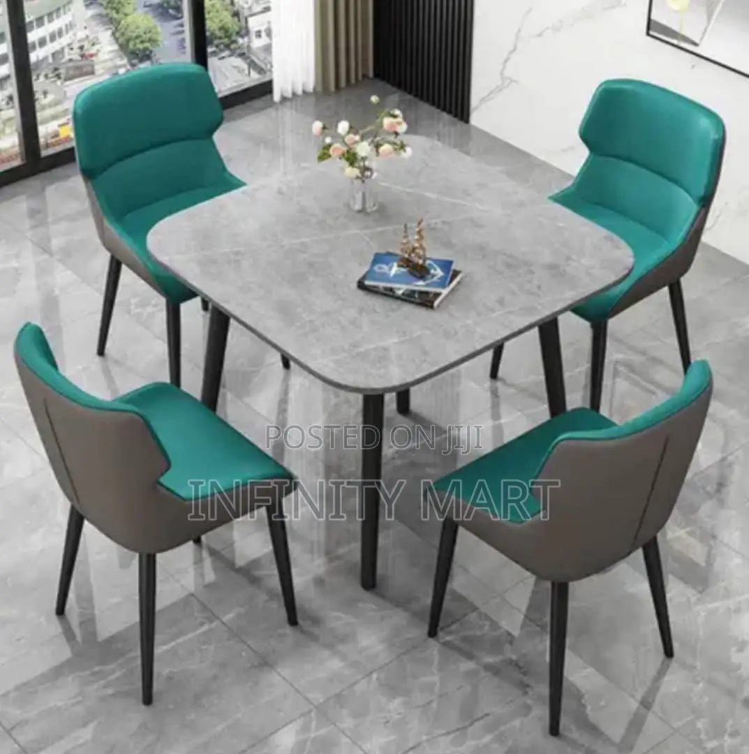 Luxury Dining Table Set (4 Chairs) – Grey Marble Top, Teal Seats.