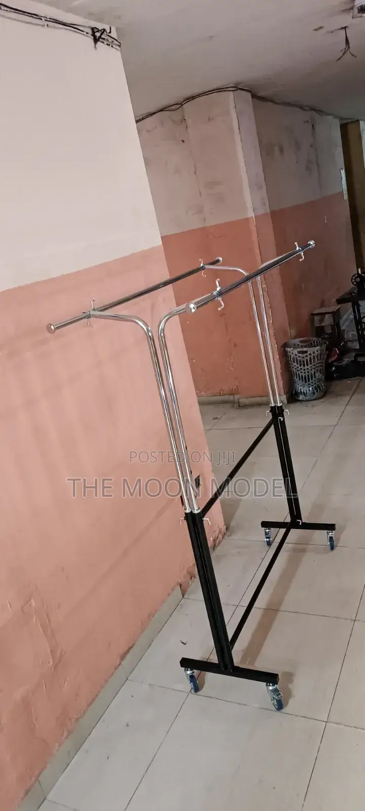 Silver And Black Cloth Rack