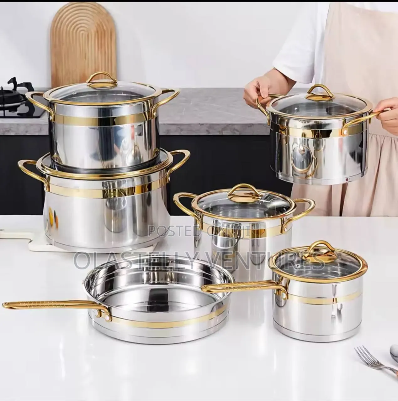 11-Piece Stainless Steel Cookware Set With Gold Accents . T