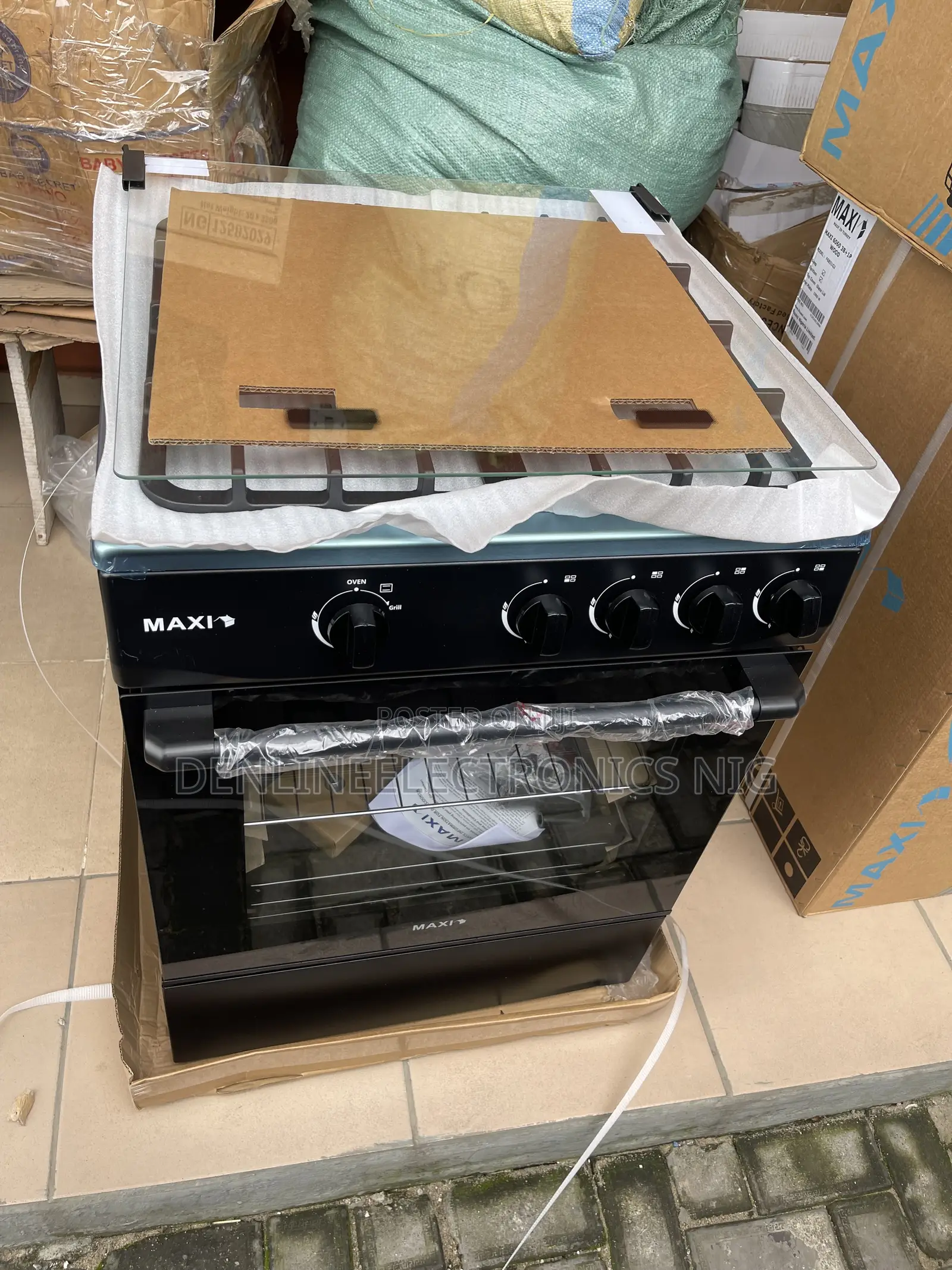 Brand New Maxi 60 by 60 Four Burners With Oven . Auto Ignition.