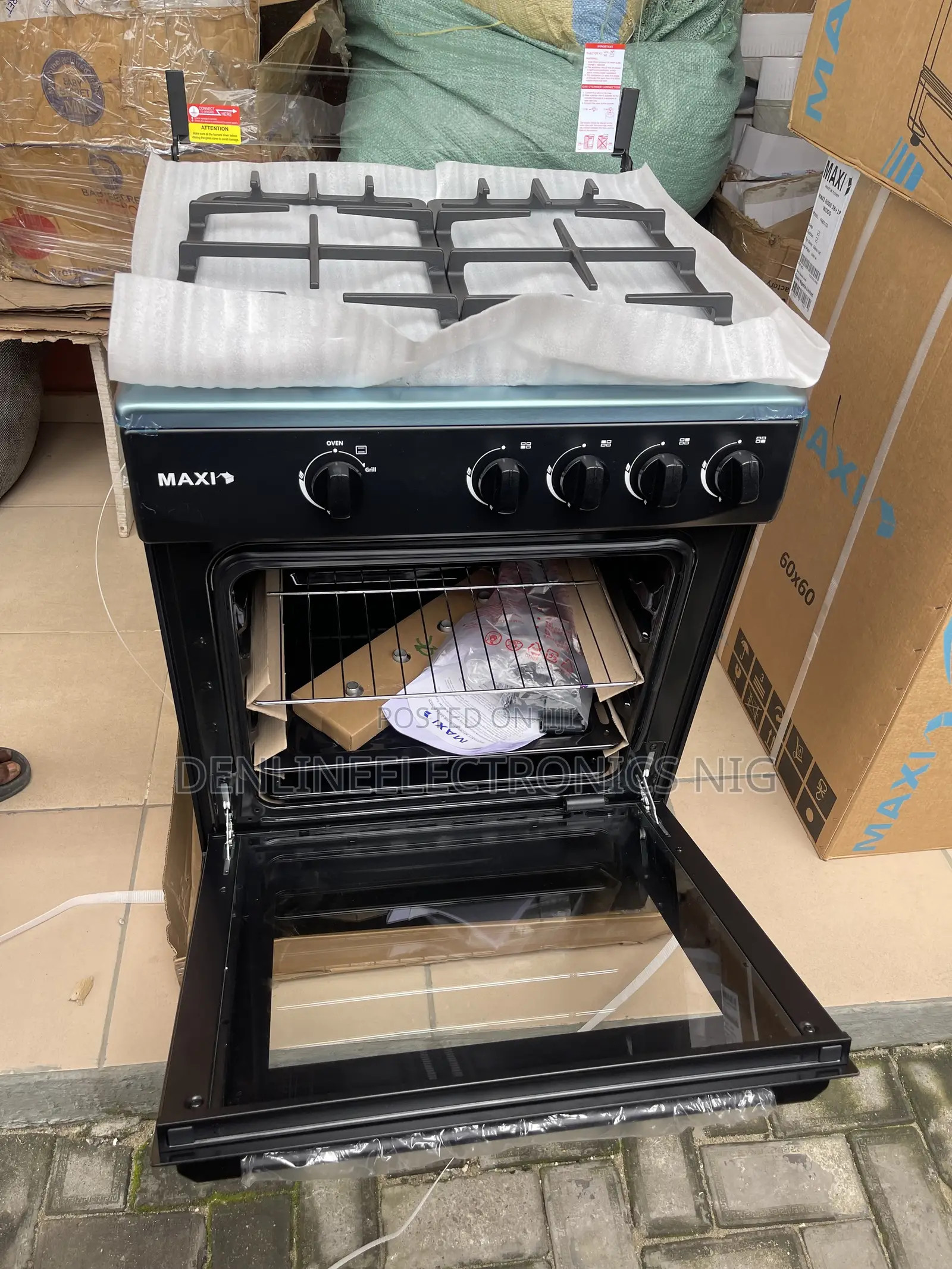 Brand New Maxi 60 by 60 Four Burners With Oven . Auto Ignition.