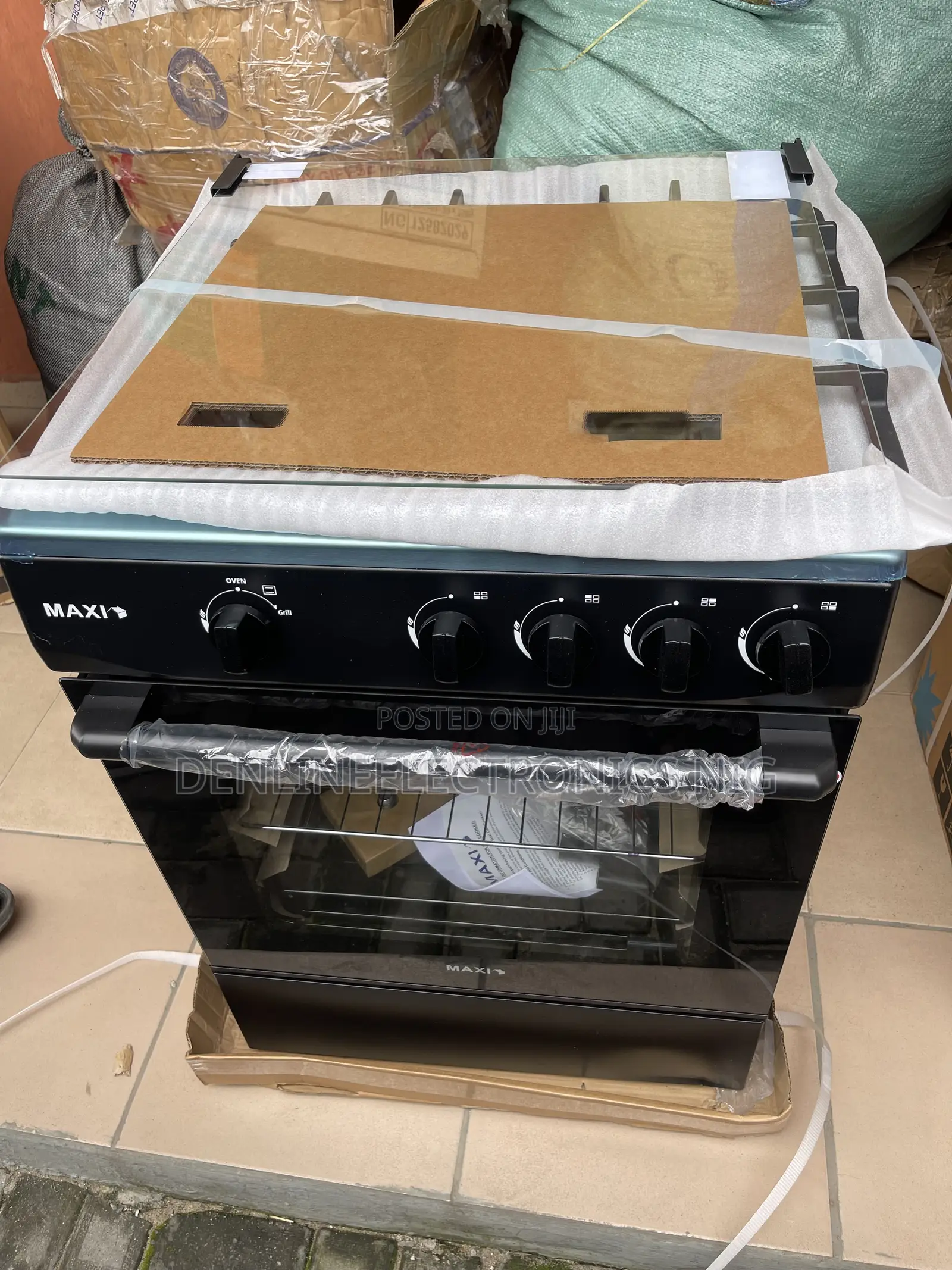 Brand New Maxi 60 by 60 Four Burners With Oven . Auto Ignition.