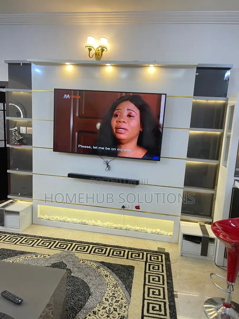 60 Inches Lg Smart Tv With Invincible Line and Tv Console