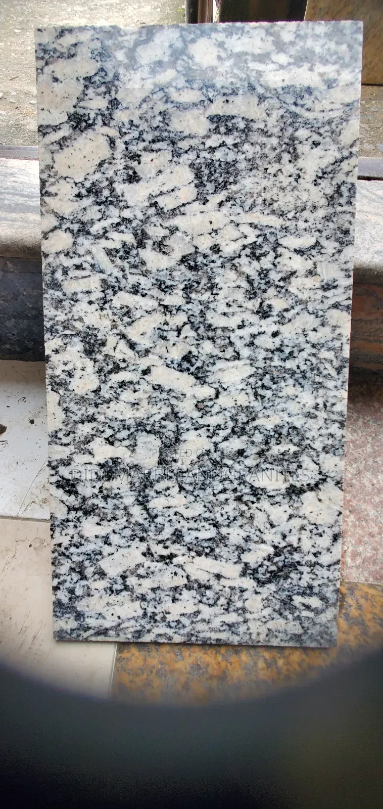 Tiger White Granite 30x60 for Hall Flooring.