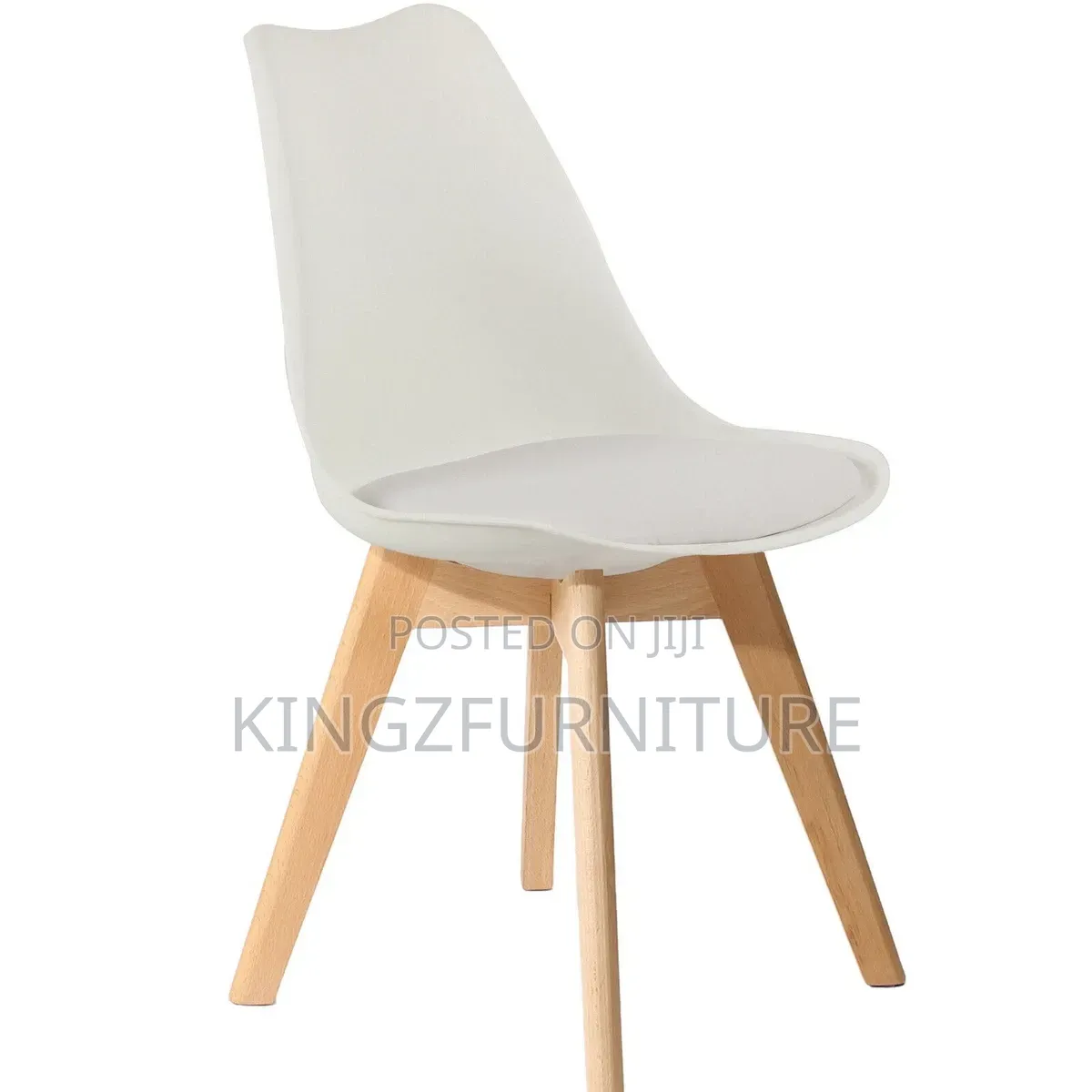 A Circle Dining Table and Four Matching Chairs.