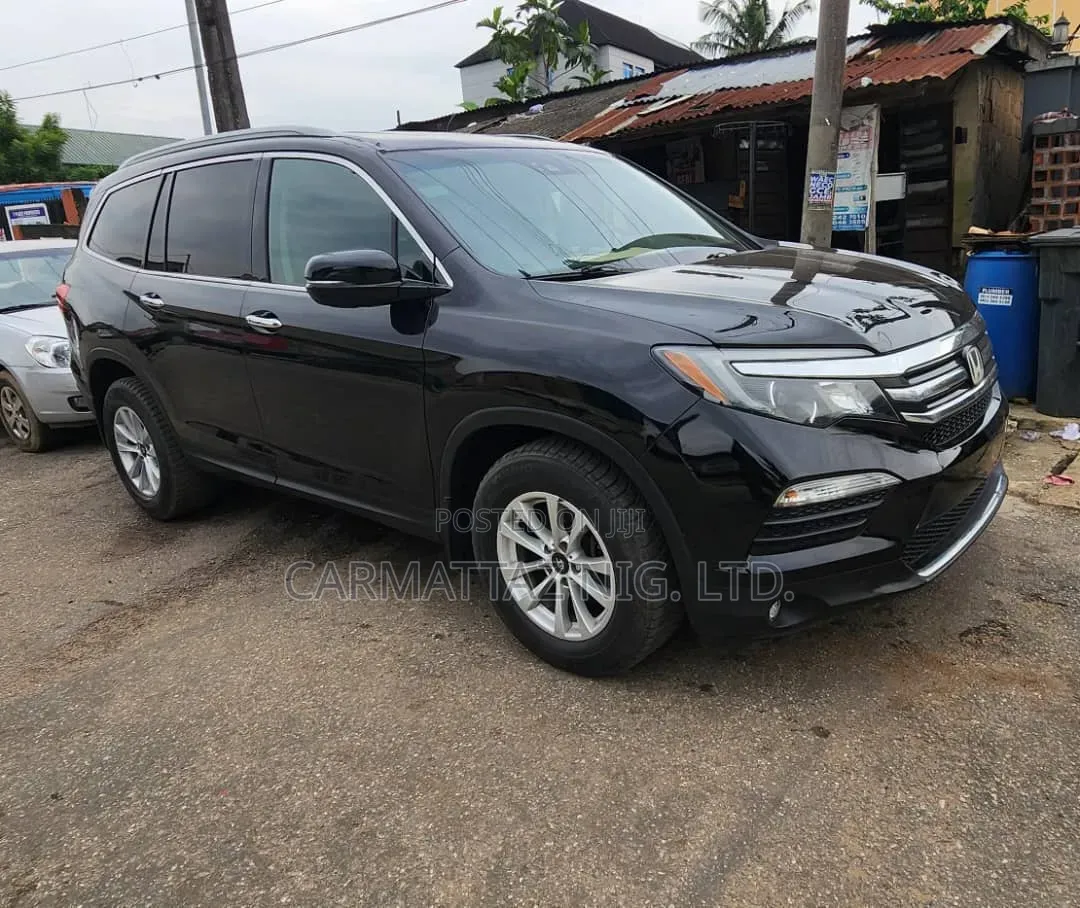 Honda Pilot Touring 4dr SUV 4WD (3.5L 6cyl 9A) 2016 Black