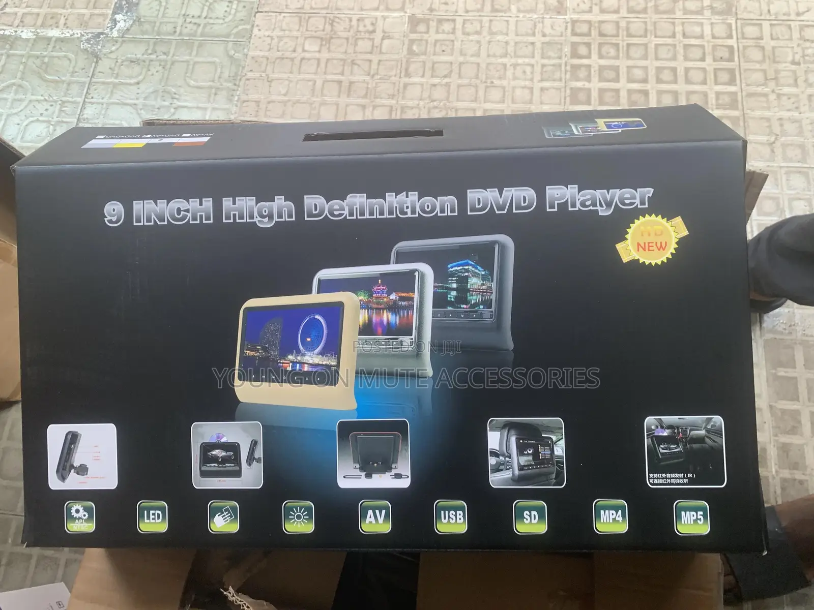 9’ Inch Universal DvD Player Featuring a Black LCD Screen.