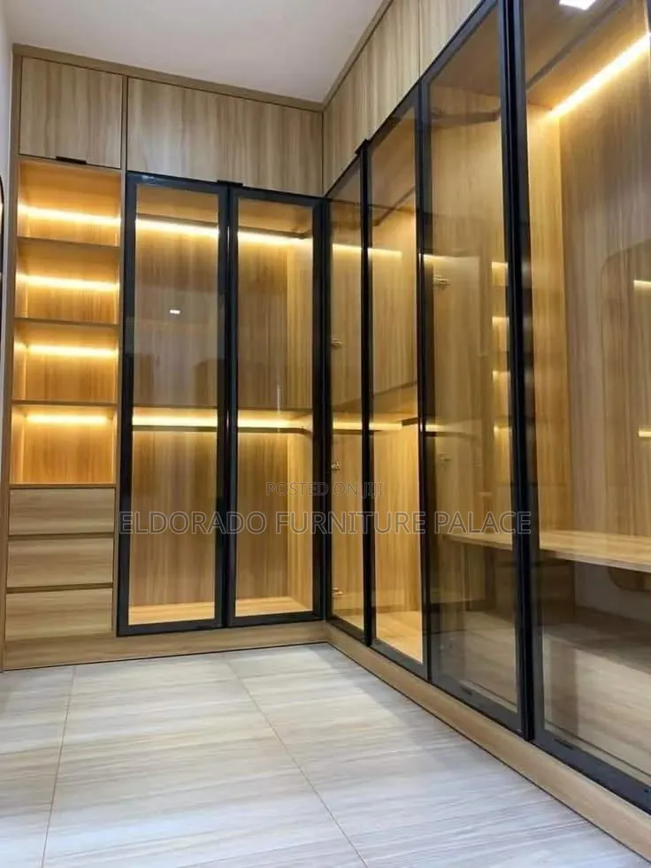 Master Bedroom Wardrobe With Frame Glass Doors and Lightings